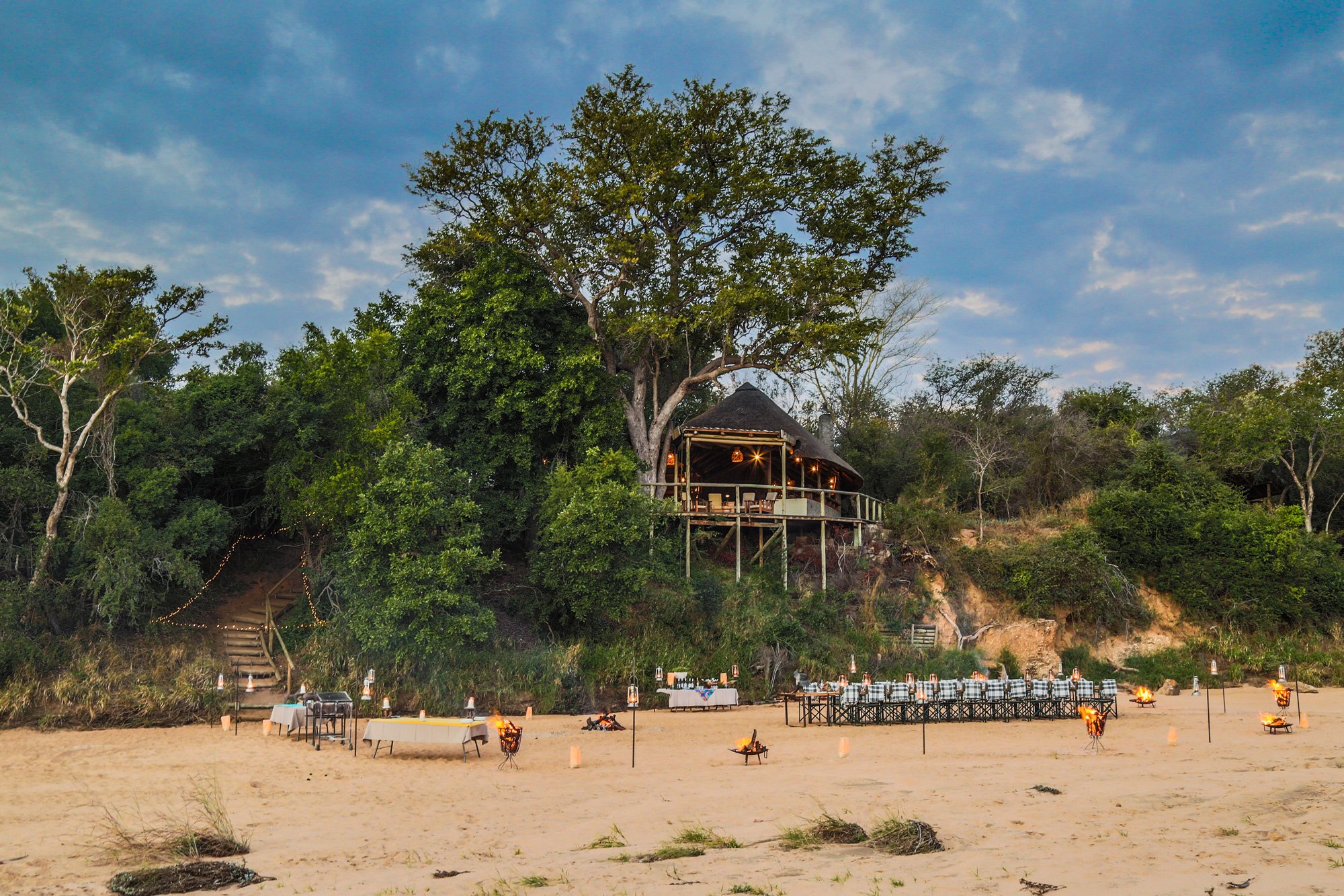 Tanda Tula Safari Camp - Dinner on the river bed - Copyright Scott Ramsay.jpg