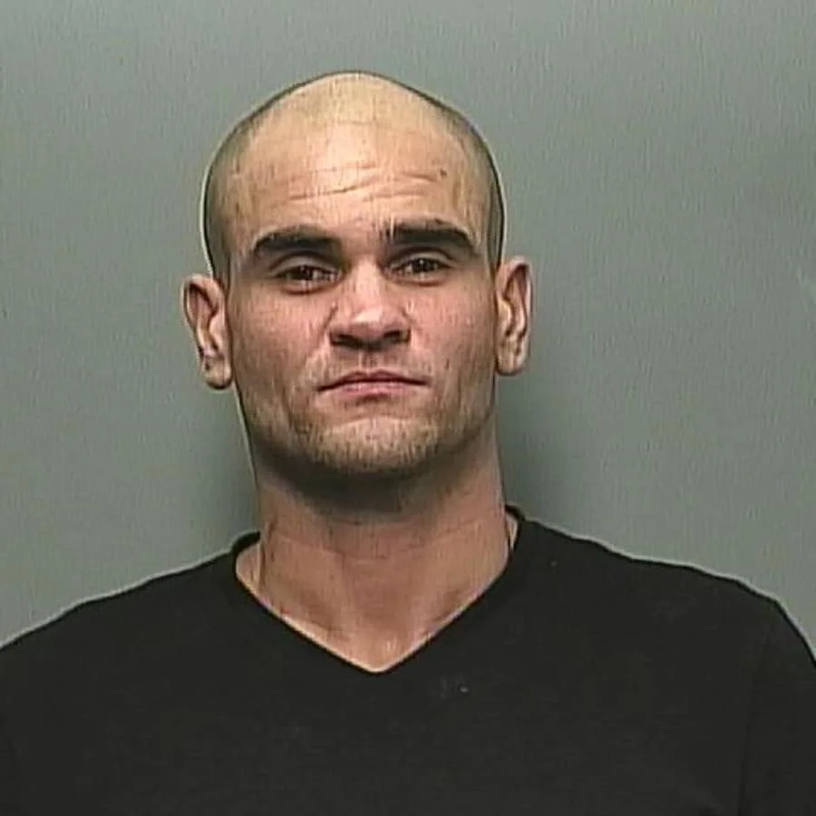 Okotoks RCMP seek assistance in locating wanted male