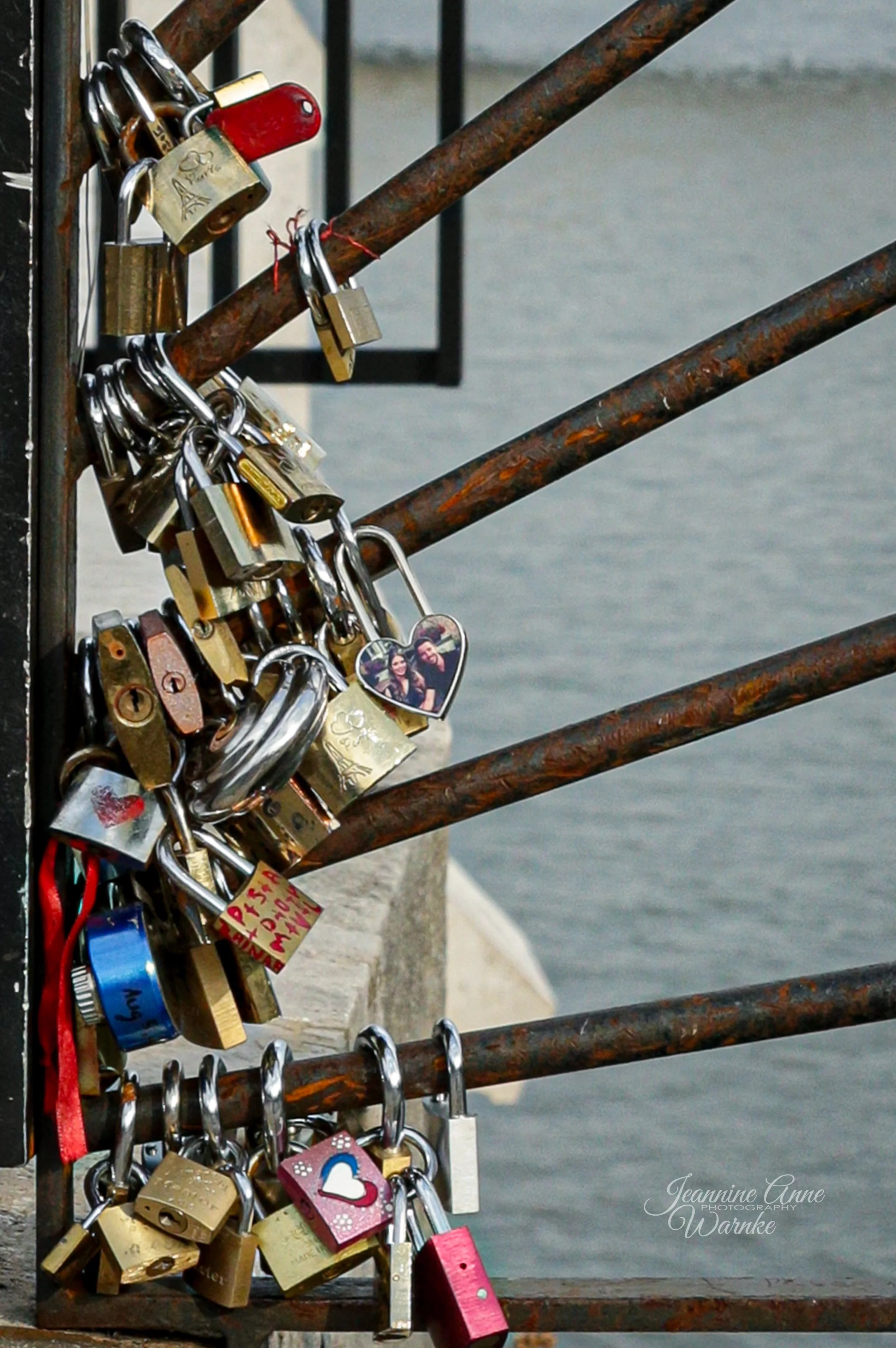 "Les cadenas d'amour"
A tradition of lovers to symbolize their eternal, unbreakable love as they throw the key into the river below. Although not official, "locks of love" are still found in obscure places throughout the city of romance.