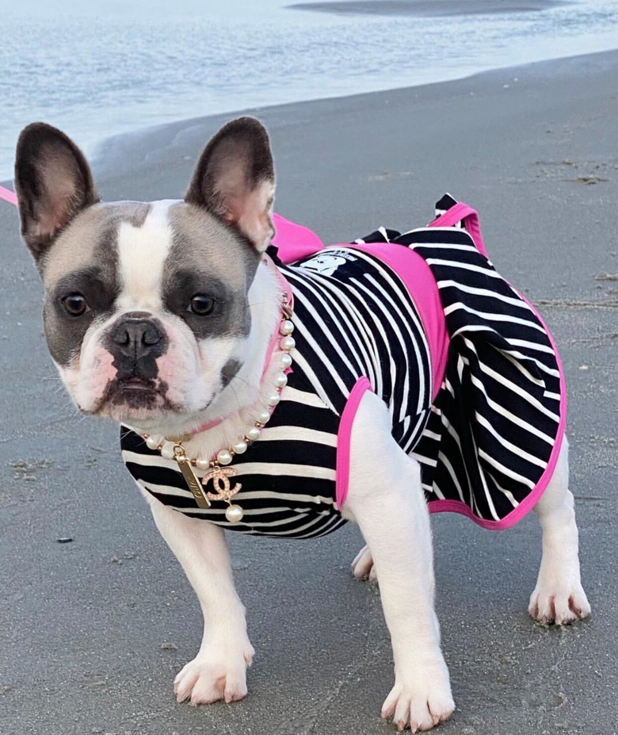 @Chloe.belle at the beach in our Dahlia Dress