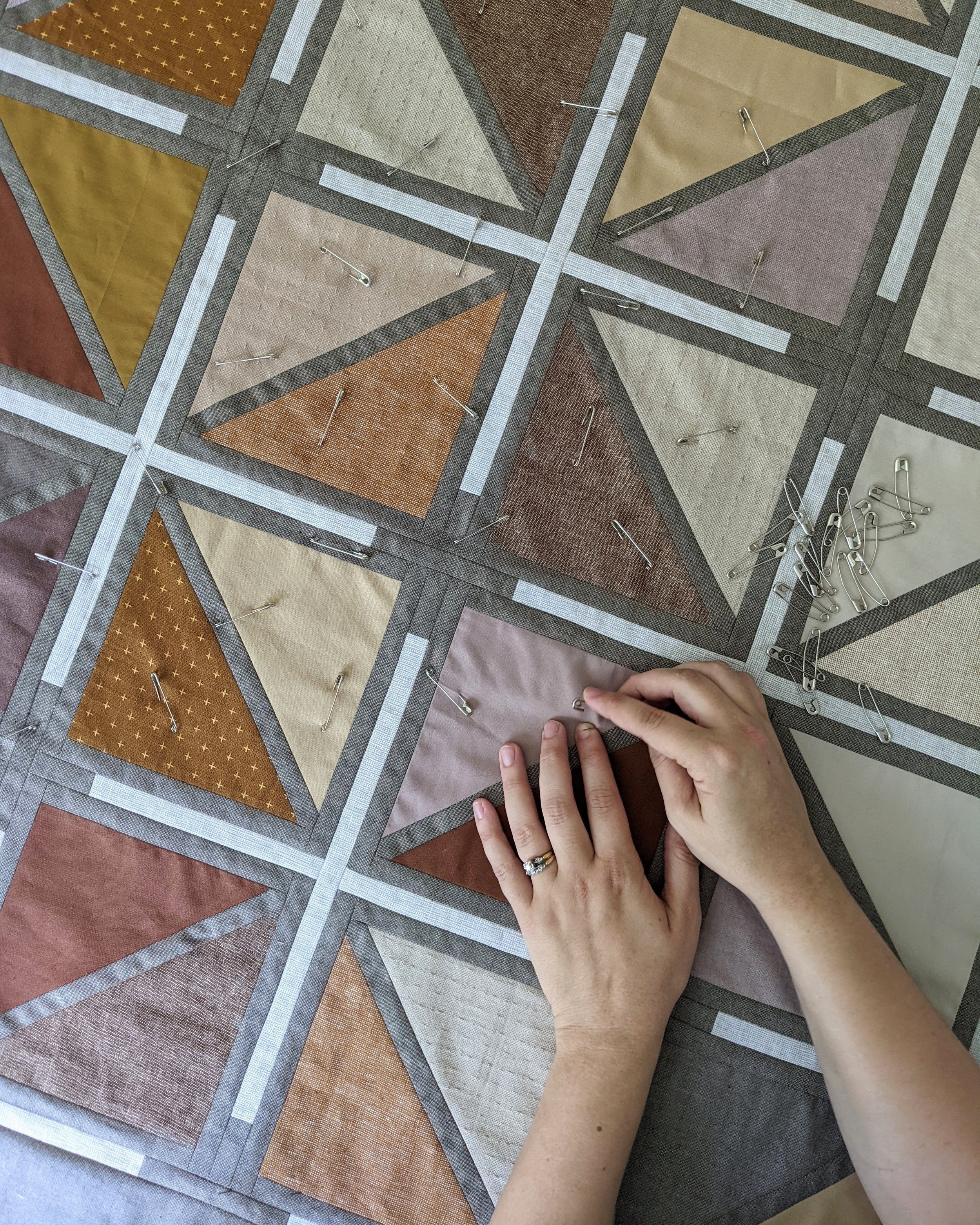 Mastering Quilt Basting: Pin vs. Spray Techniques Unveiled