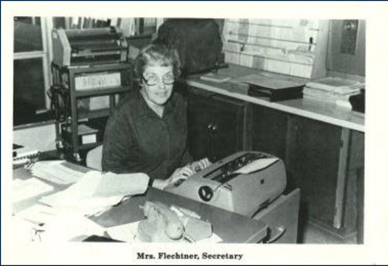 Mrs. Barbara Flechtner at her desk at Glen School