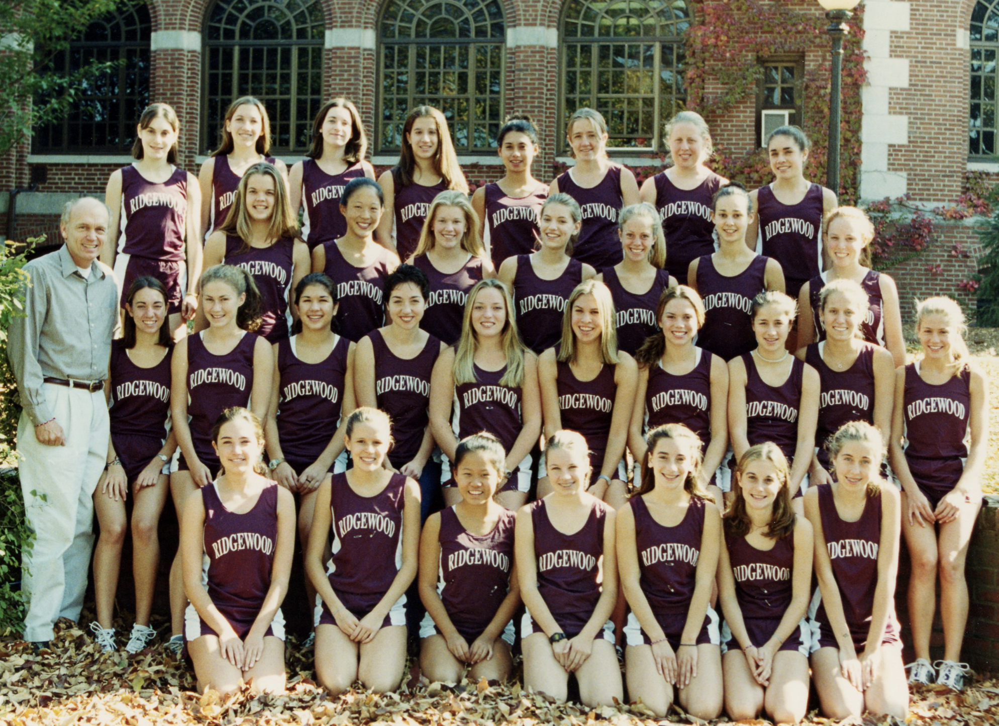 Girls’ 2001 Cross Country TeamCoach Jacob Brown