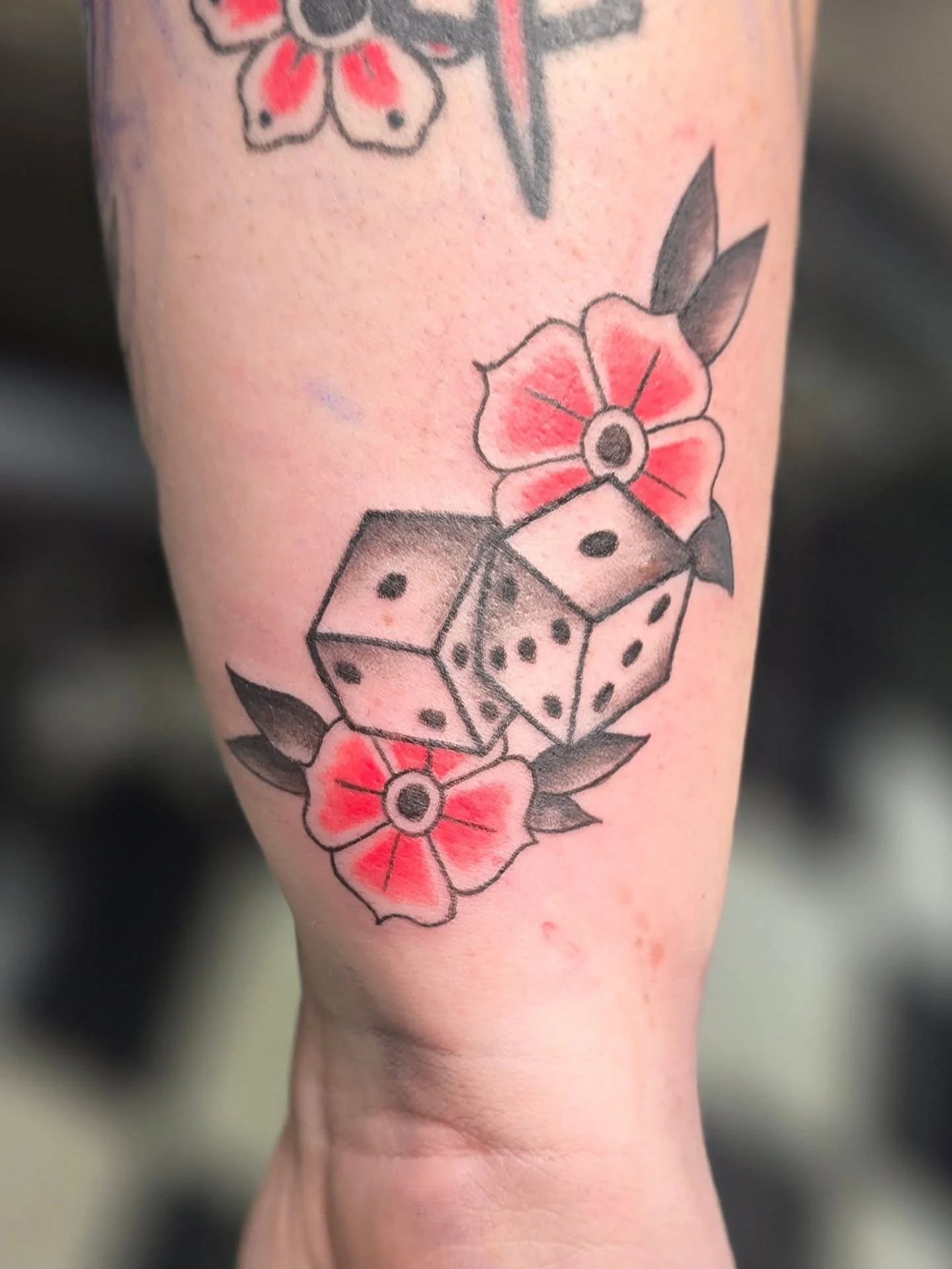 Some really fun &quot;traditional&quot; snake eye dice with flowers and my latest haircut by @1212hairstudio . She's extremely talented with curly hair, cute shags, and the grow out process (project bonsai). She is in a beautiful salon in Lakewood an