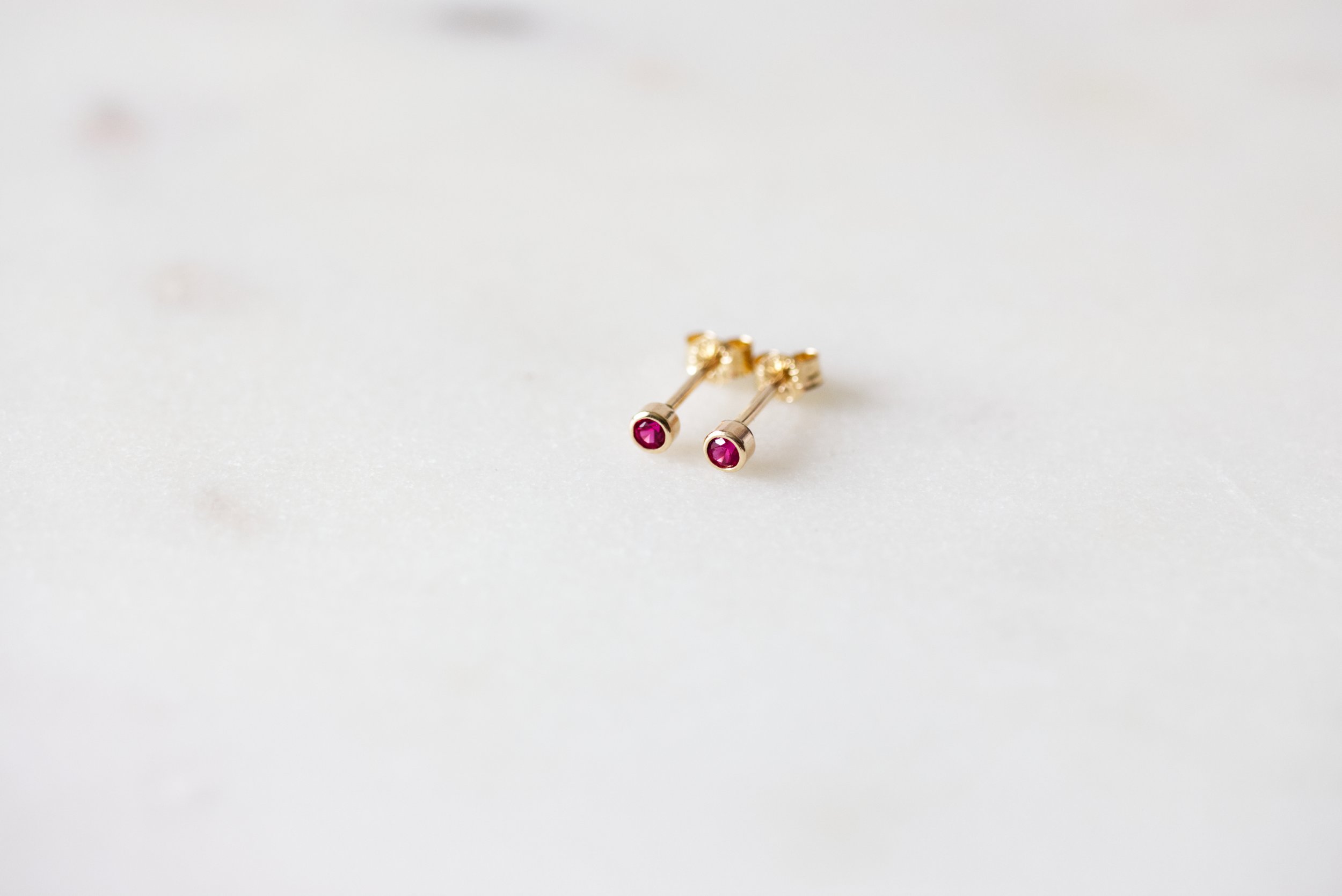 Tiny Ruby Gold Stud Earrings