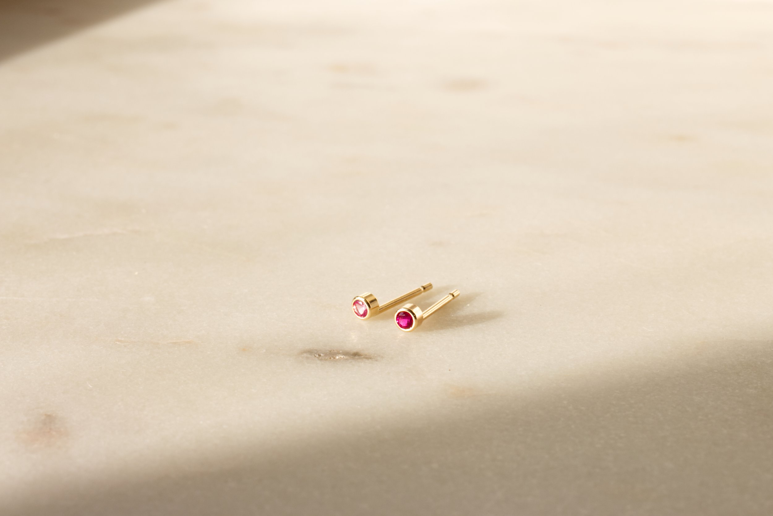 Tiny Ruby Gold Stud Earrings