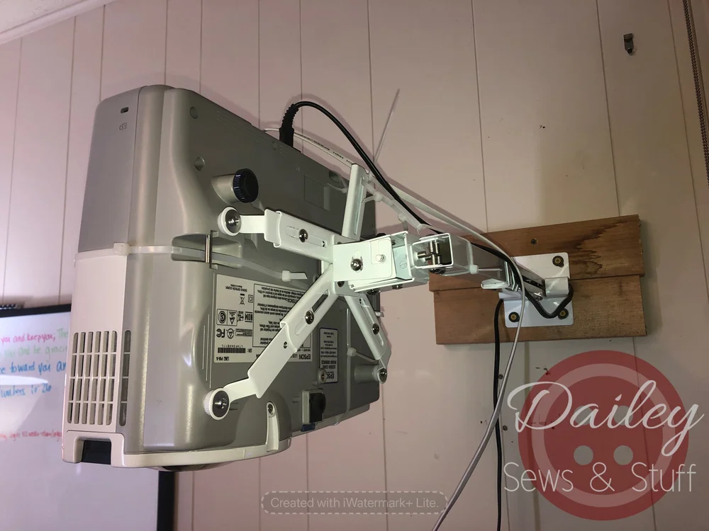 projector on wood on wall.JPG