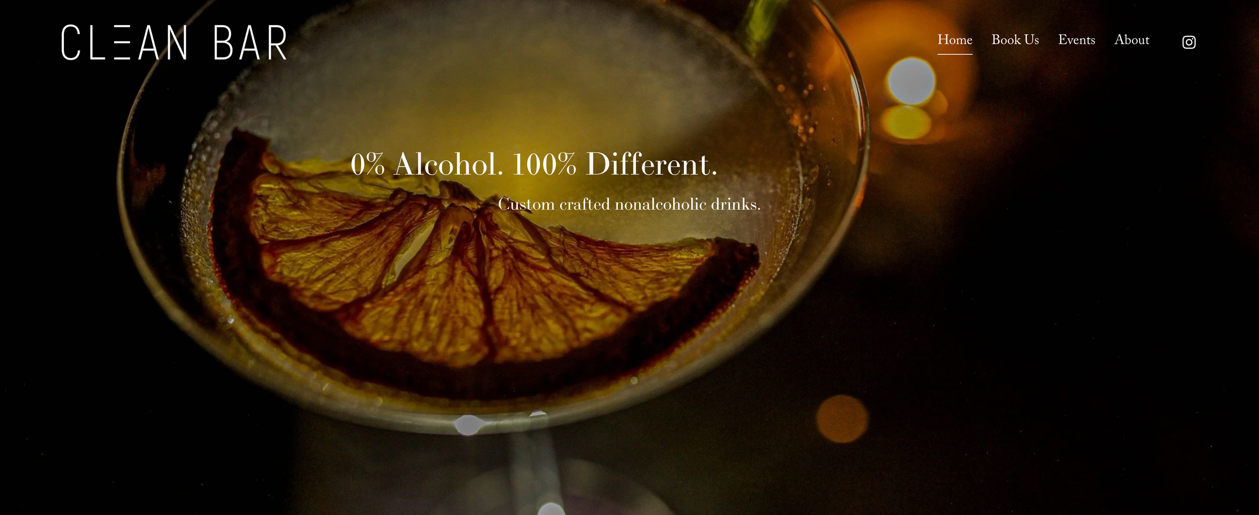 Clean Bar PDX (Portland) Home Page with close up of a drink with citrus floating on the top.