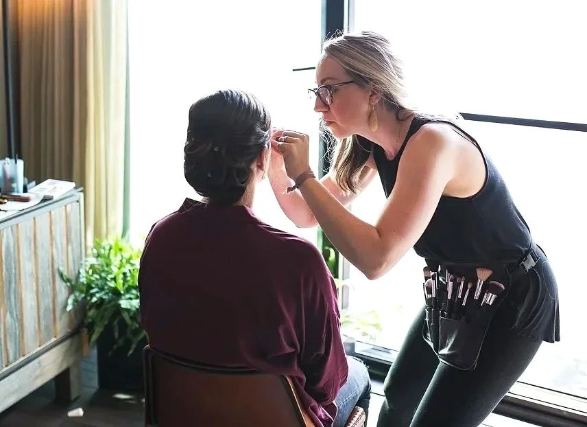 rebecca kirkwood applying makeup