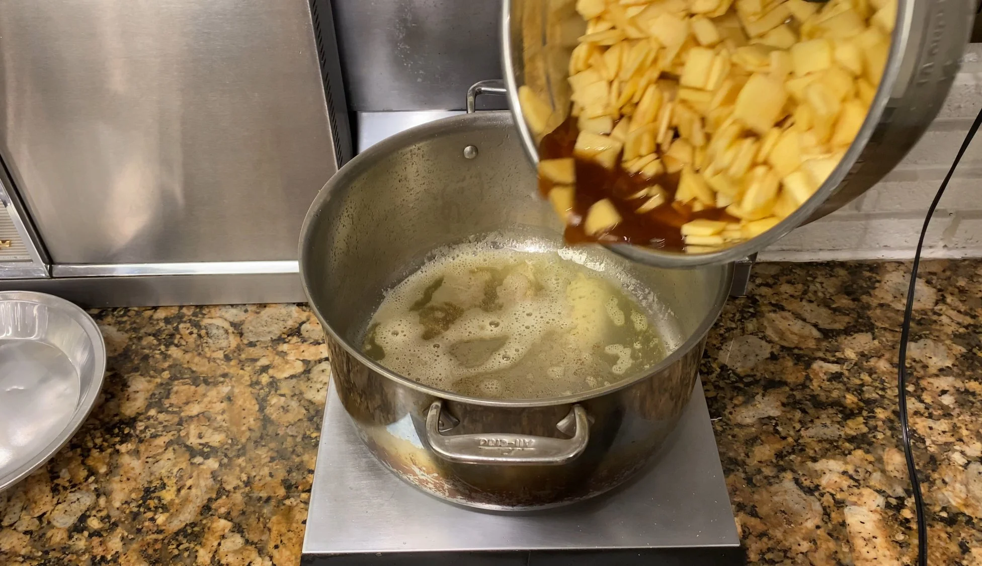 apples into pot.jpeg