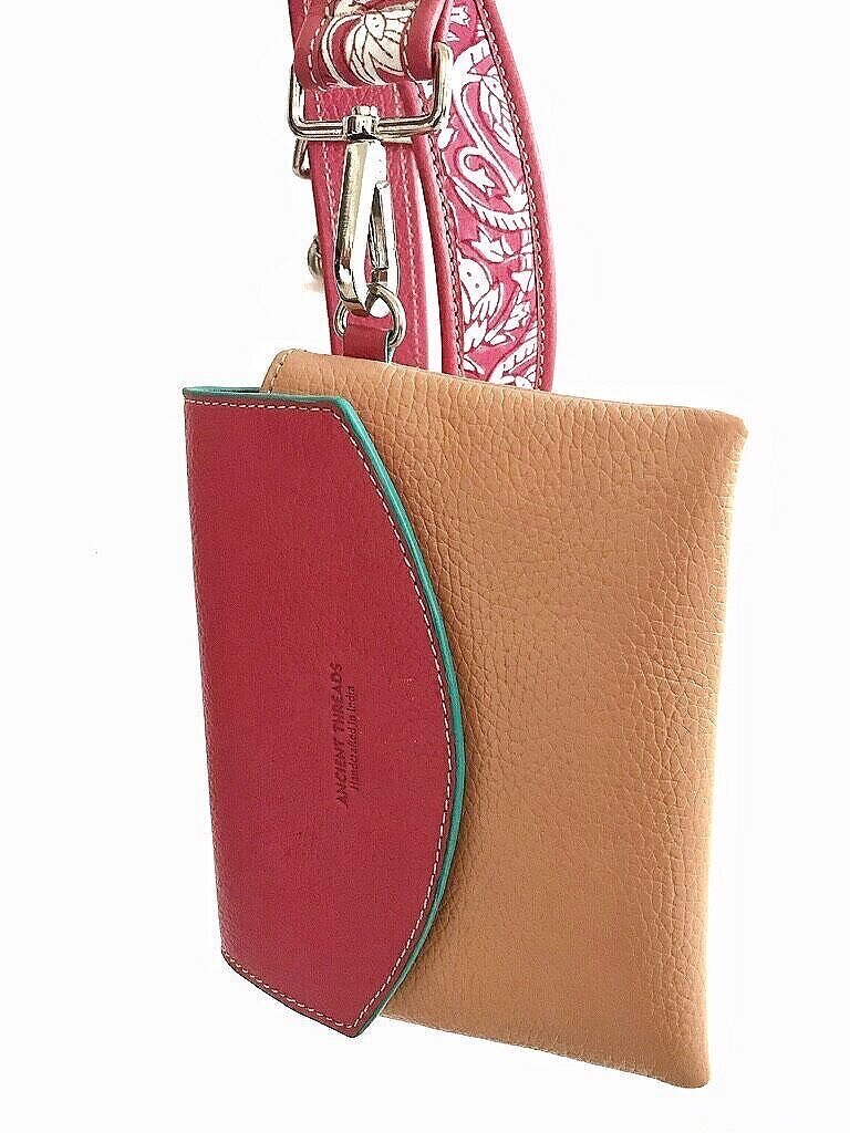 accessories bag handcrafted from bovine leather & blockprinted fabric lined