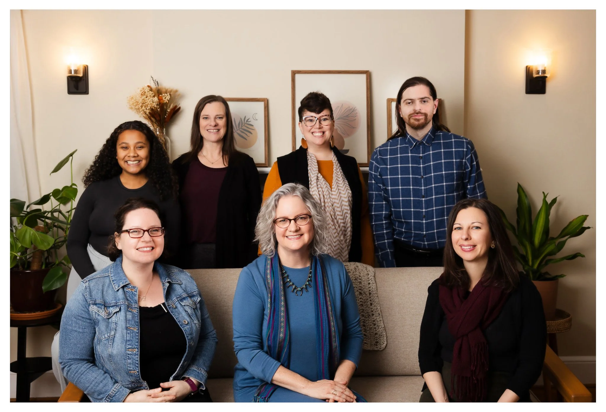 Four corners staff sitting on a couch