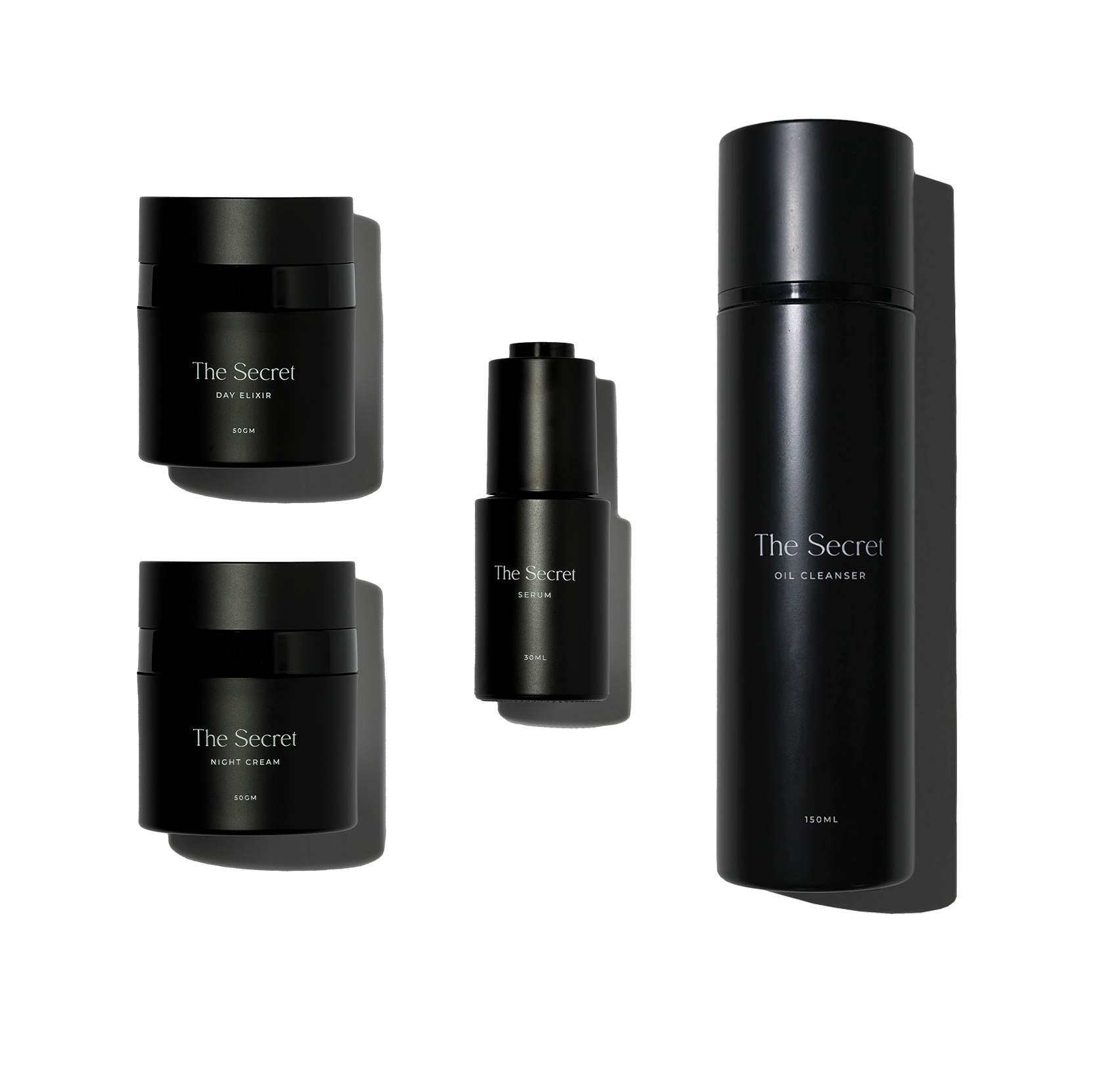 A collection of black skincare products from The Secret, including daytime elixir, night cream, serum, and oil cleanser, arranged on a reflective surface with a mirrored background.