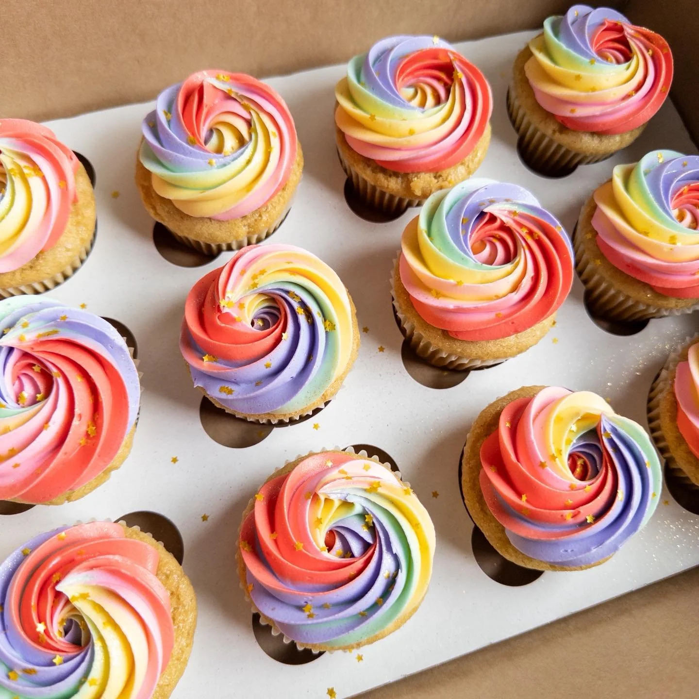 Happy Friday!!! I was reminded by sotacracklers to make a post, so enjoy these rainbow cupcakes with a little color twist!