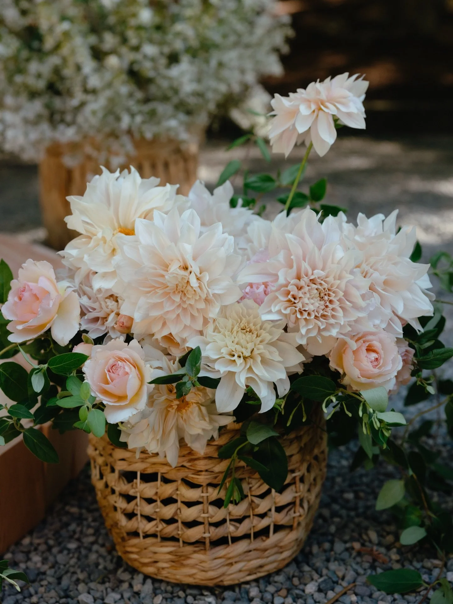 Ceremony details from A + A&rsquo;s special day. Baskets of the most perfect cafe au lait dahlias, antique hydrangeas, and sky blue delphinium helped us frame the gorgeous wood stage crafted by the groom himself. 

Planning &amp; Design: @willaviawed