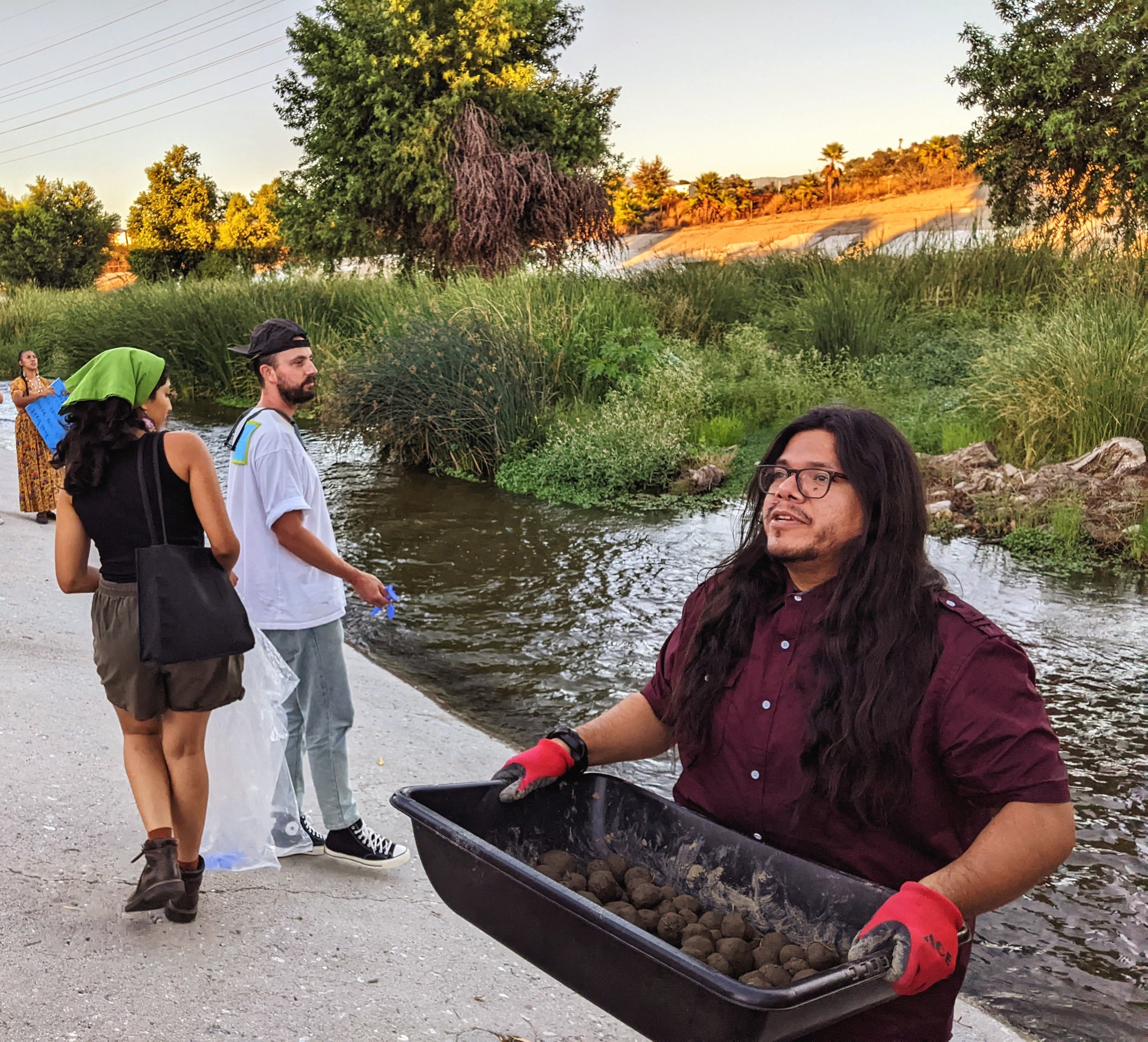 Jo Dominquez with native seed bombs. /Photo: Jenna Didier