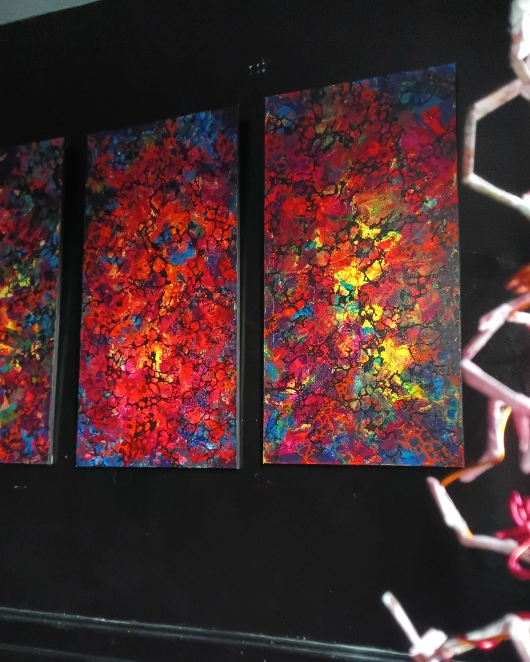 Three large-scale works from my UV-reactive series, installed during exhibition.

These pieces shift between visibility and concealment depending on the light, revealing hidden layers, fluorescent structures, and fragile internal landscapes that rema