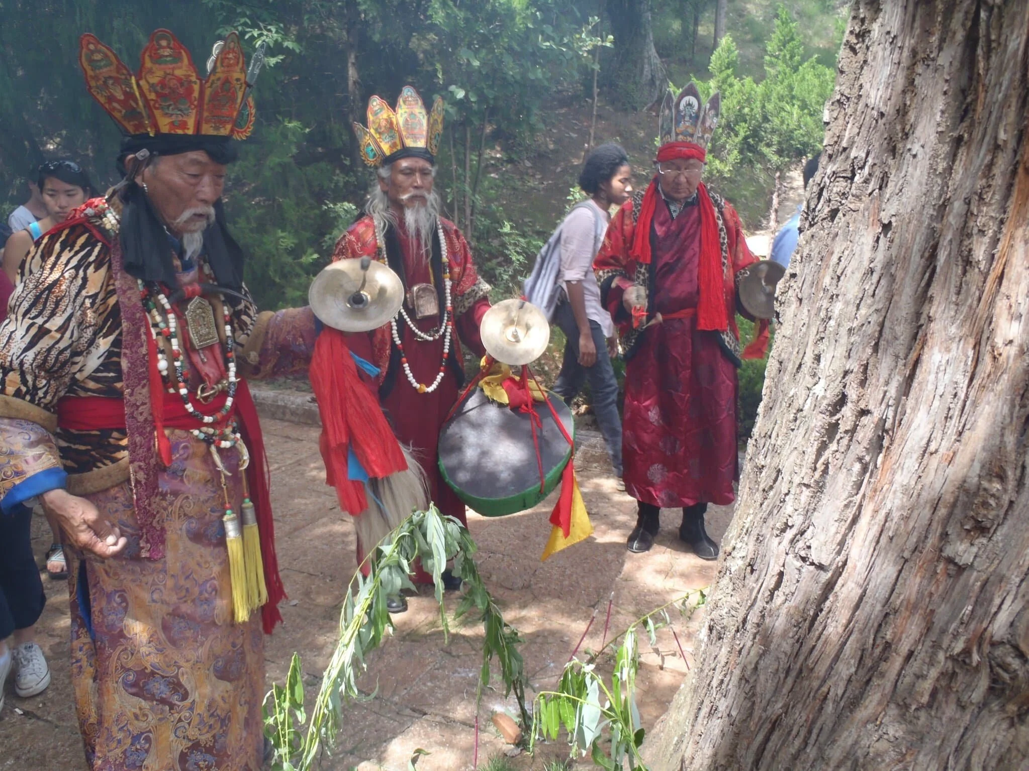 Naxi Dongba sages doing a blessing. Dongba medicine is a meshing of religion, song, dance, and traditional medicine (Dangba Shamanism)