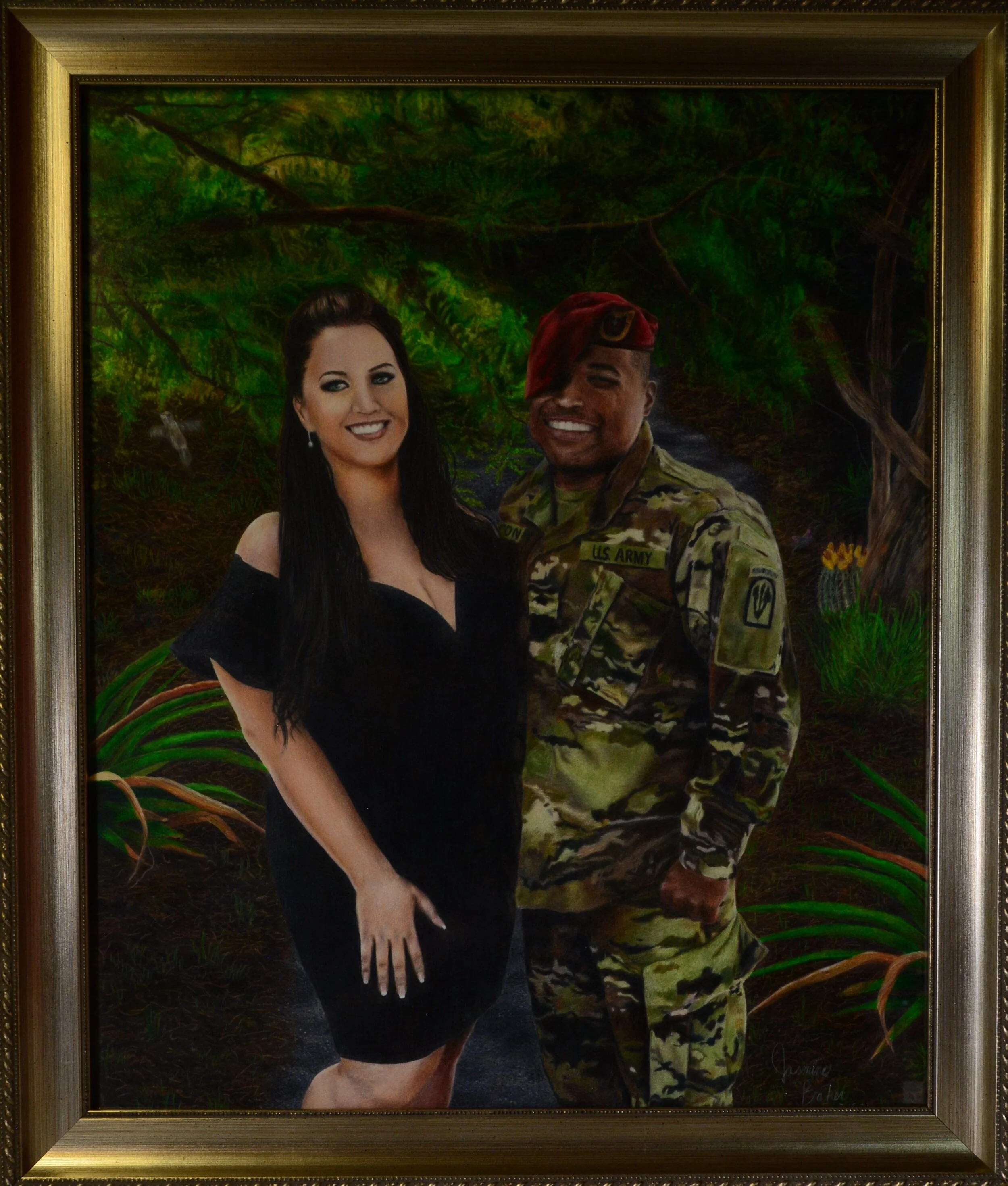 Framed portrait of woman in black dress and man in U.S. Army uniform with beret, standing in a wooded area.