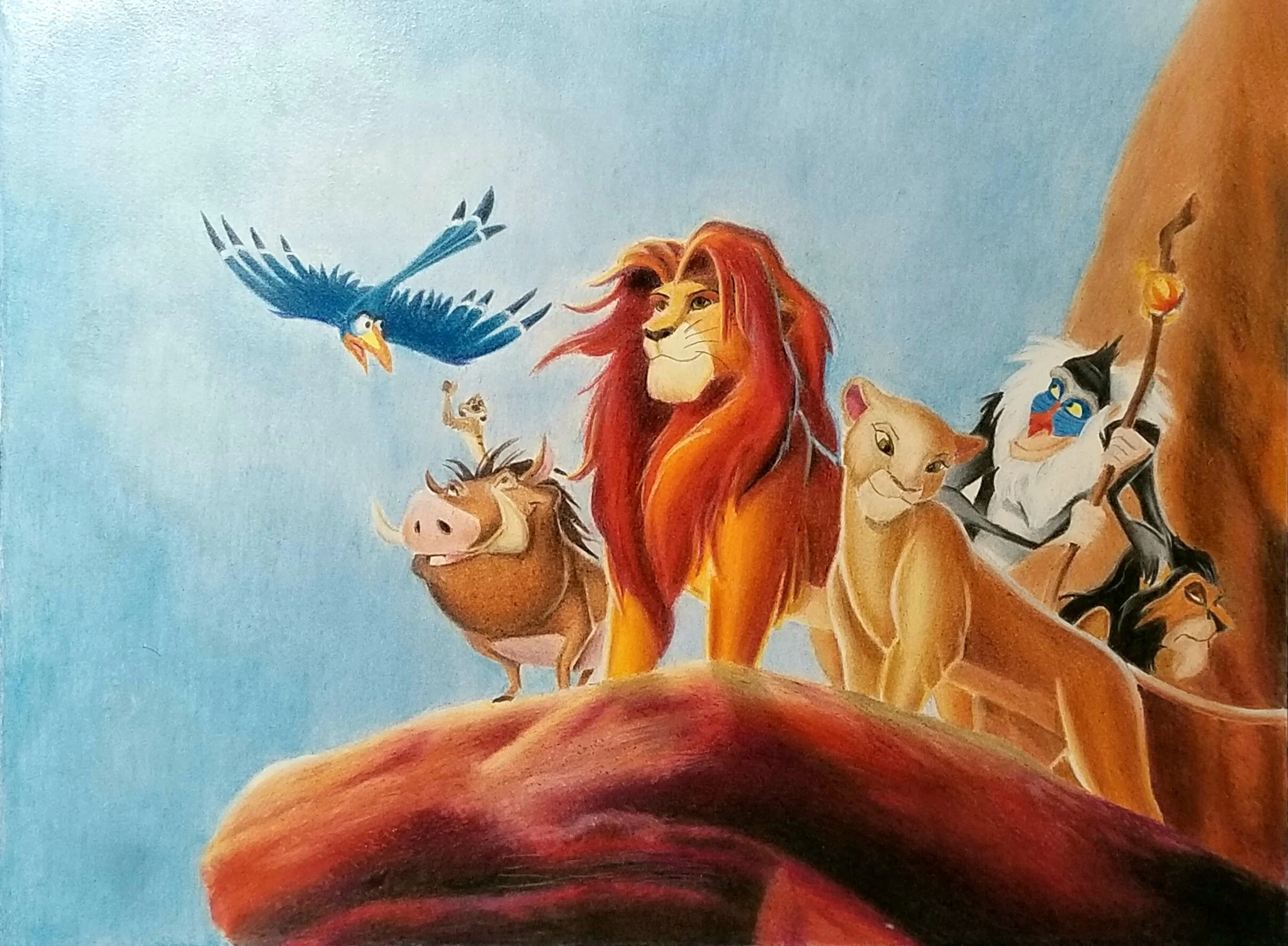 Illustration of animals from an animated movie, including a lion, lioness, warthog, meerkat, hornbill, and mandrill standing on a rock with a blue sky background.