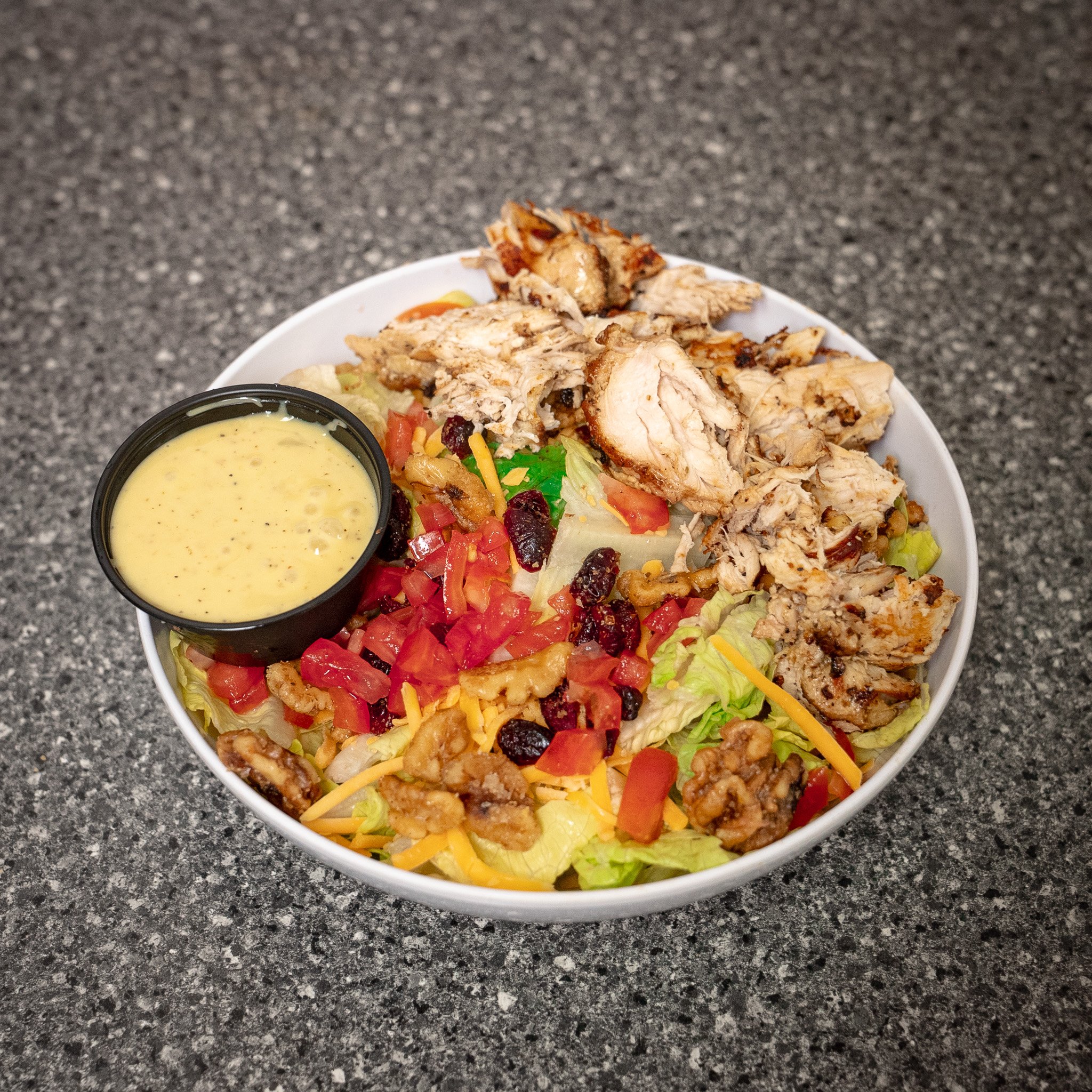 Come try our SWEET SHORELINE salad! 🥗 Grilled chicken, crisp lettuce, craisins, walnuts, tomatoes, and cheese&mdash;served with sweet Vidalia onion dressing. Fresh, flavorful, and made just for you!