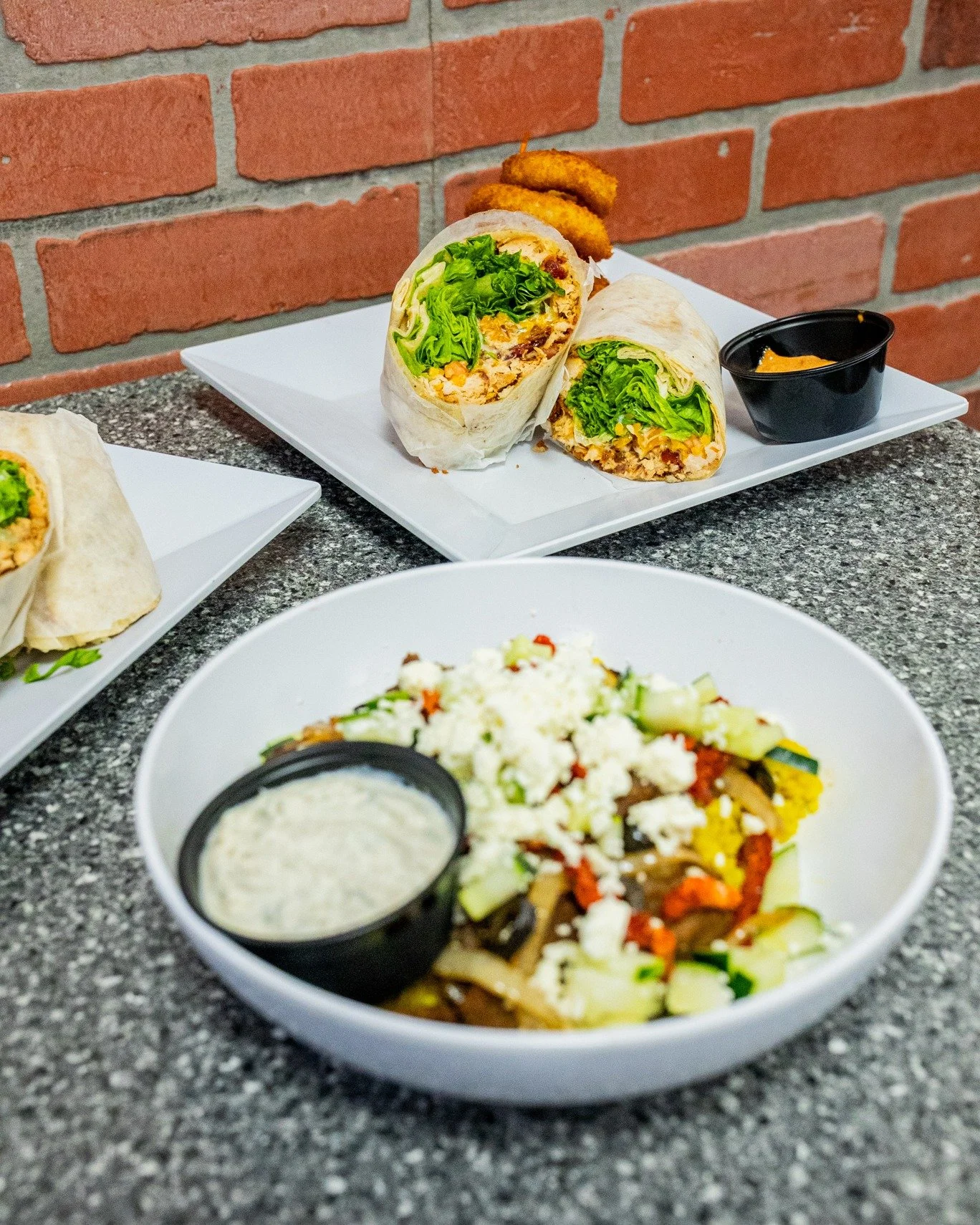 Wrap up your lunch the right way. 🌯
Juicy grilled chicken, crispy bacon, melted cheddar, crisp lettuce, ripe tomato, and cool ranch all rolled into one. A classic combo that always hits the spot.