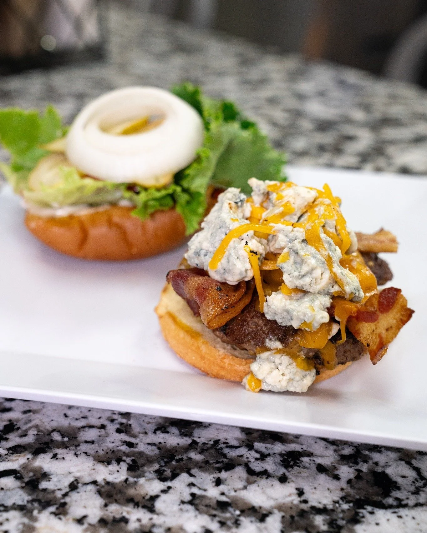 Where bold meets delicious. 🍔
Our Blue Mountain Burger is stacked with a juicy hamburger patty, crispy bacon, melted cheddar, and tangy blue cheese. Big flavor in every bite.