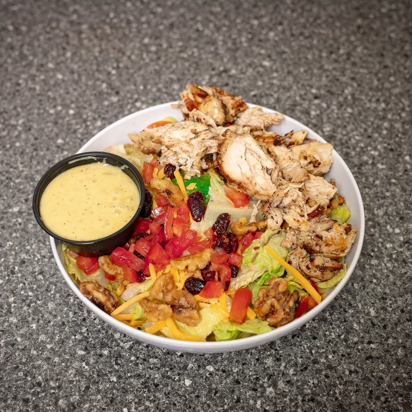 Fresh, sweet, and full of crunch. 🥗
Our Sweet Shoreline Salad comes with grilled chicken, craisins, walnuts, tomatoes, and cheese&mdash;served with our signature sweet Vidalia onion dressing. A little sunshine in every bite.