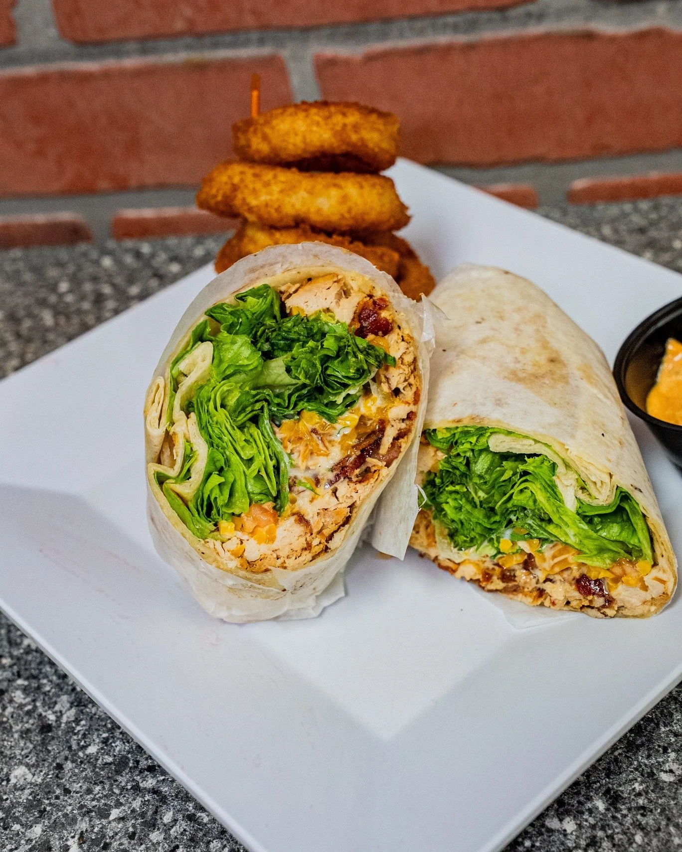 A classic you can&rsquo;t go wrong with. 🌯
Grilled chicken, crispy bacon, cheddar cheese, lettuce, tomato, and ranch&mdash;our Chicken Club Wrap is fresh, flavorful, and always a fan favorite.