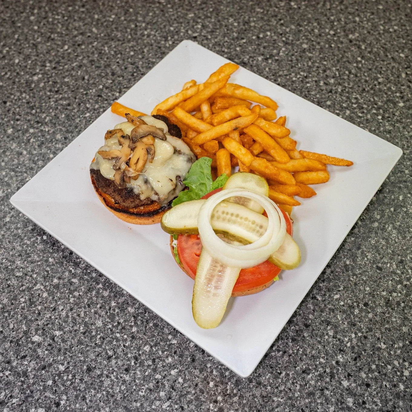A good burger and fries never goes out of style 🍔 Hot, juicy, and ready when you are!