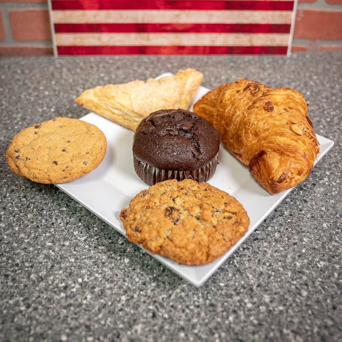 Fresh baked pastries on the counter and coffee brewing ☕🥐 Come on in.