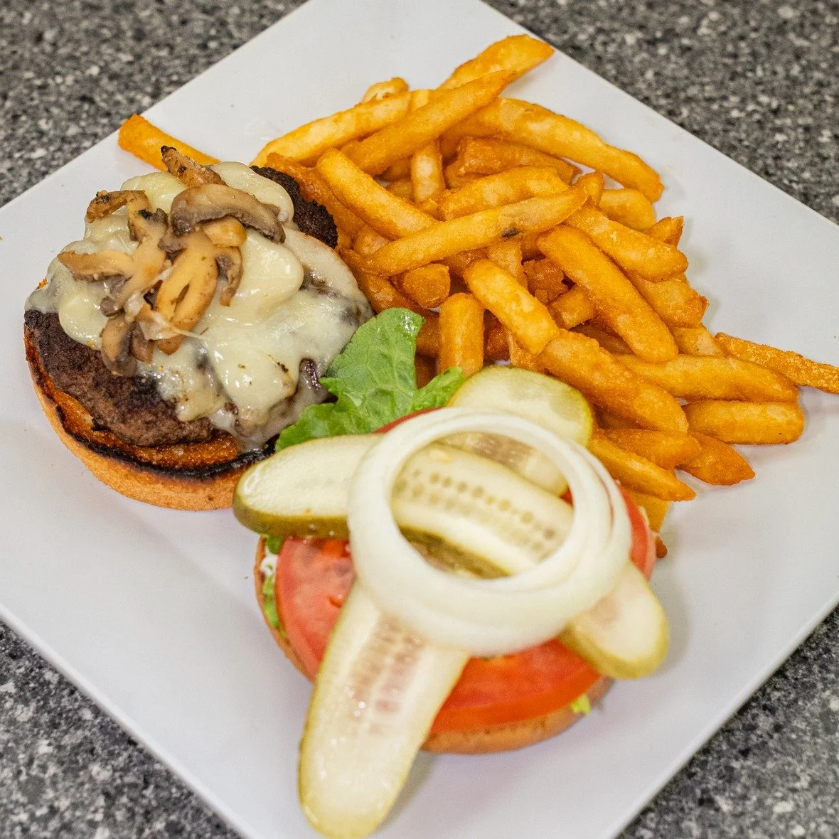 Looking for a juicy, savory meal? Look no further. Our burgers are packed with flavor and grilled to perfection! 🍔 Stop in and see for yourself.