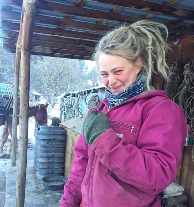 Sadie with a bird and a smile