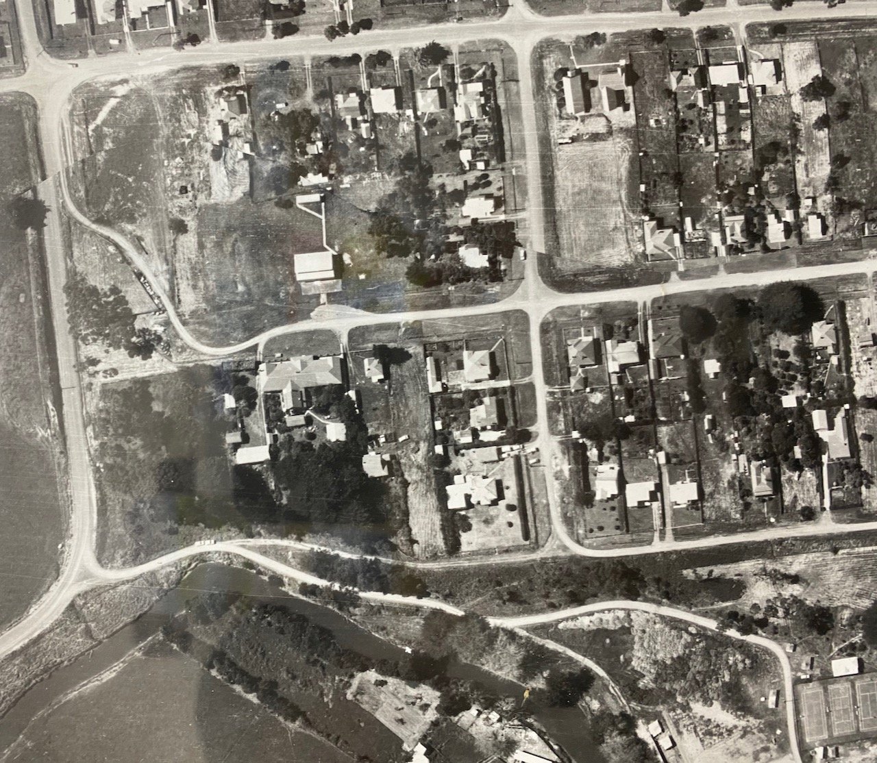 By the 1960's you can see the extension has been built and the Lilly Pilly planted.