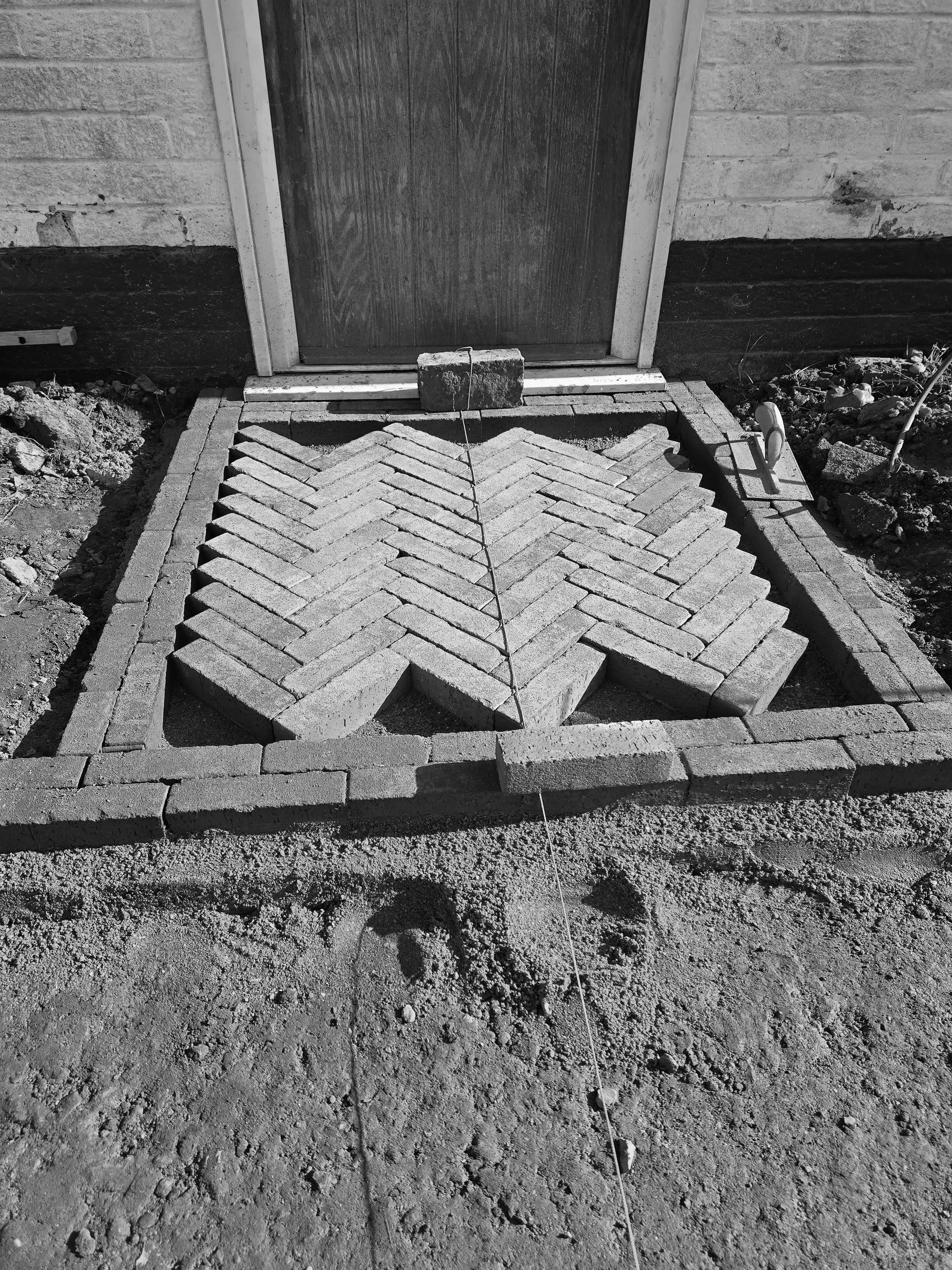 Clay Paver Herringbone Path Under Construction