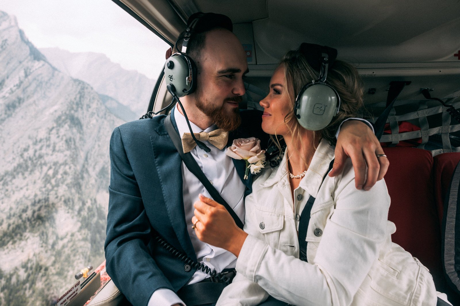 couple looking at each other in the helicopter