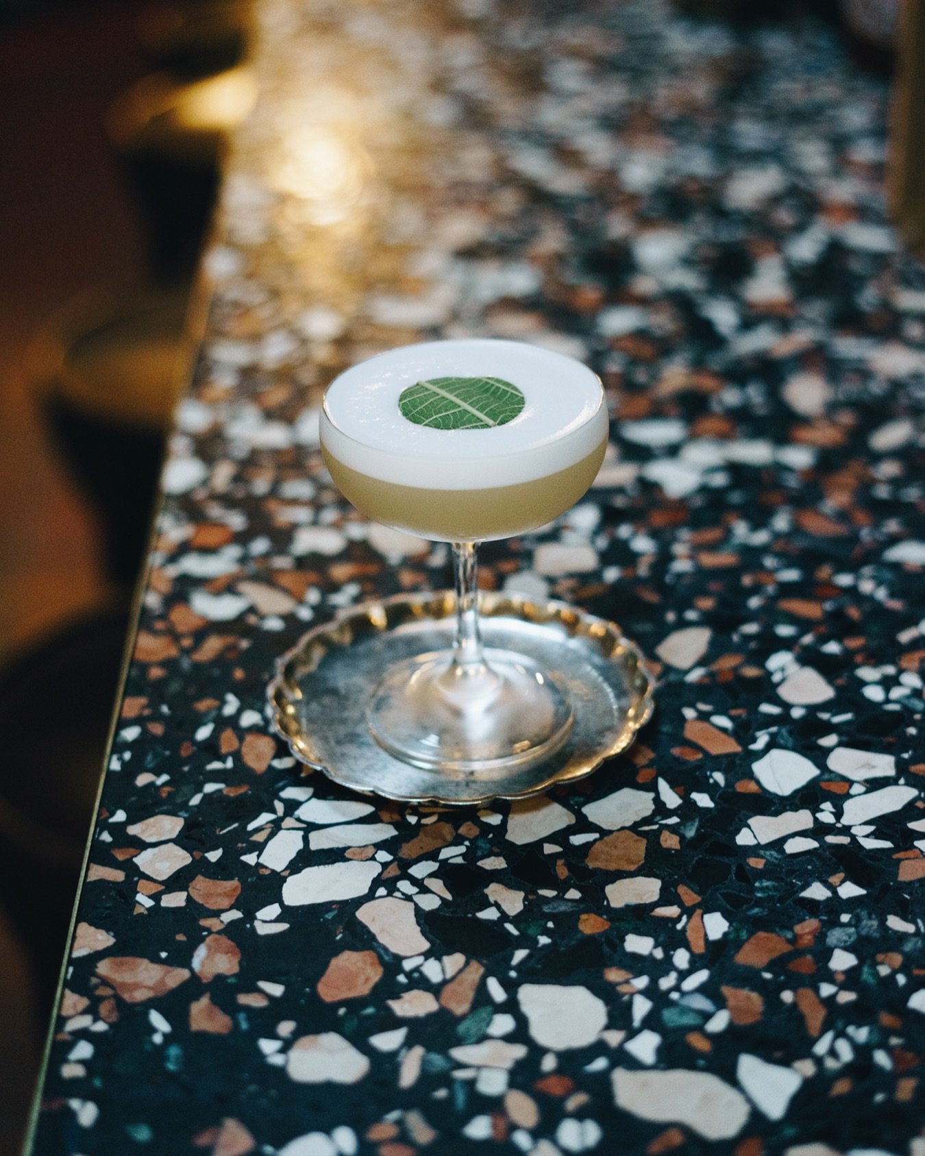 An emerging fan favourite from our new cocktail list! 
𝙁𝙄𝙂 𝙋𝙃𝘼𝙎𝙀 - coconut infused vodka, fig liqueur, orange &amp; cinnamon myrtle syrup, citrus, foam 🥥 🍊 

Bookings for the week ahead at our Cocktail Bar &amp; Bistro-theque can be made vi
