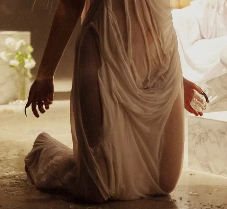 priestess woman on her knees in a temple