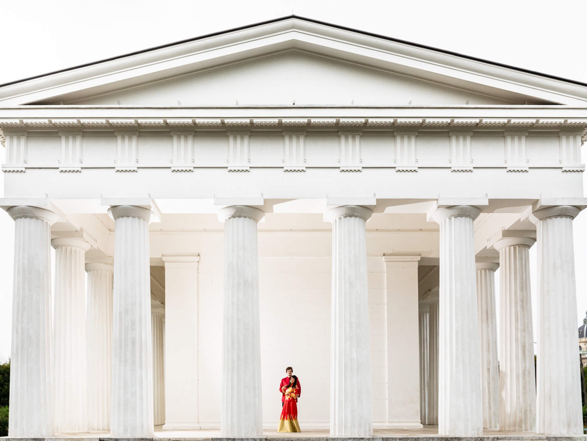 Couple in front of Theseus Temple in the Volksgarten Vienna.