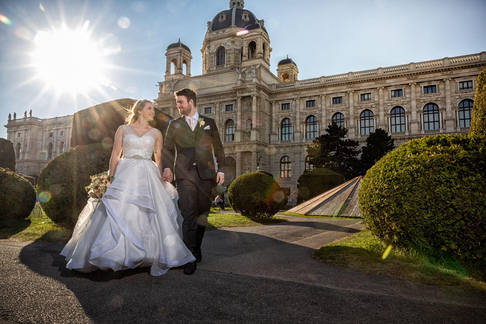 Folklore Museum Vienna with bridal couple in the foreground and low sun