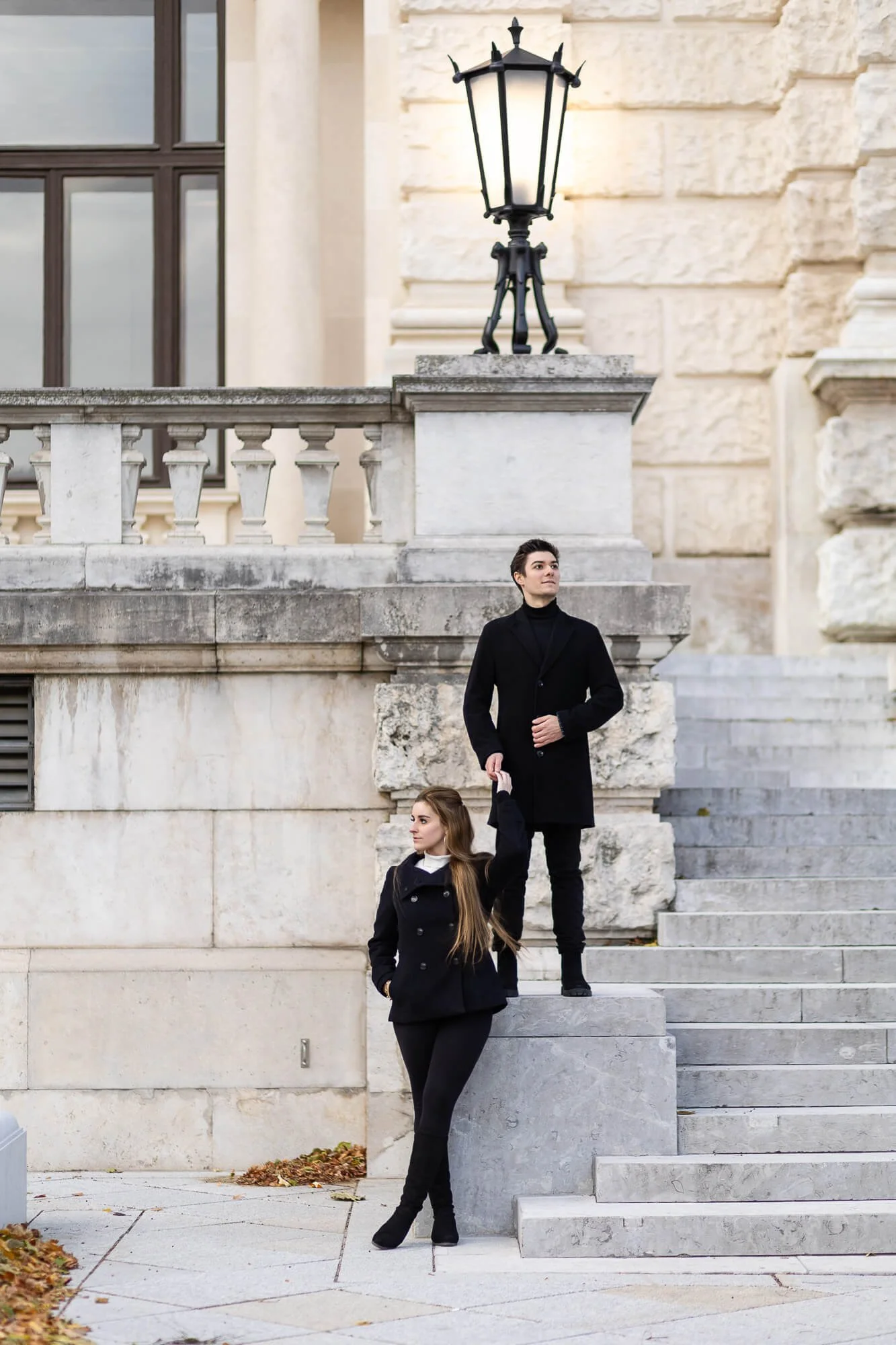 Engagement photos Burggarten Vienna with strong pose of the couple with confidence.