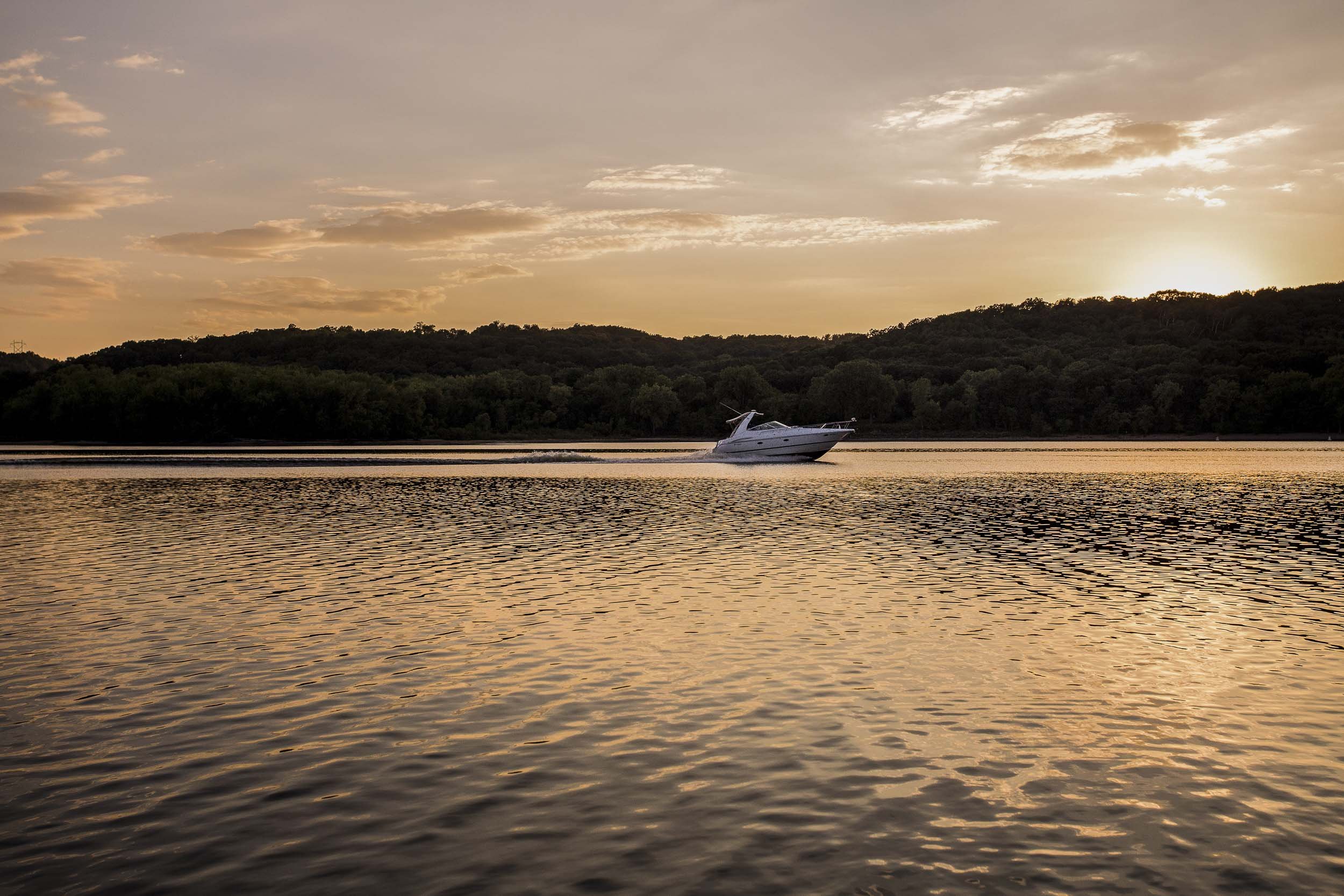 boat on river photo at night