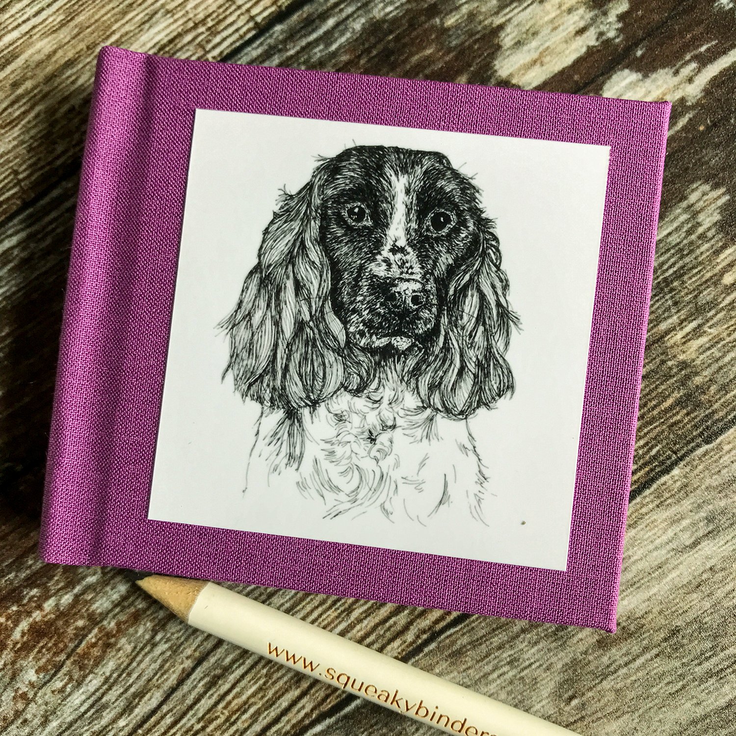 Mini_journal_Springer_purple_front_pencil.jpg