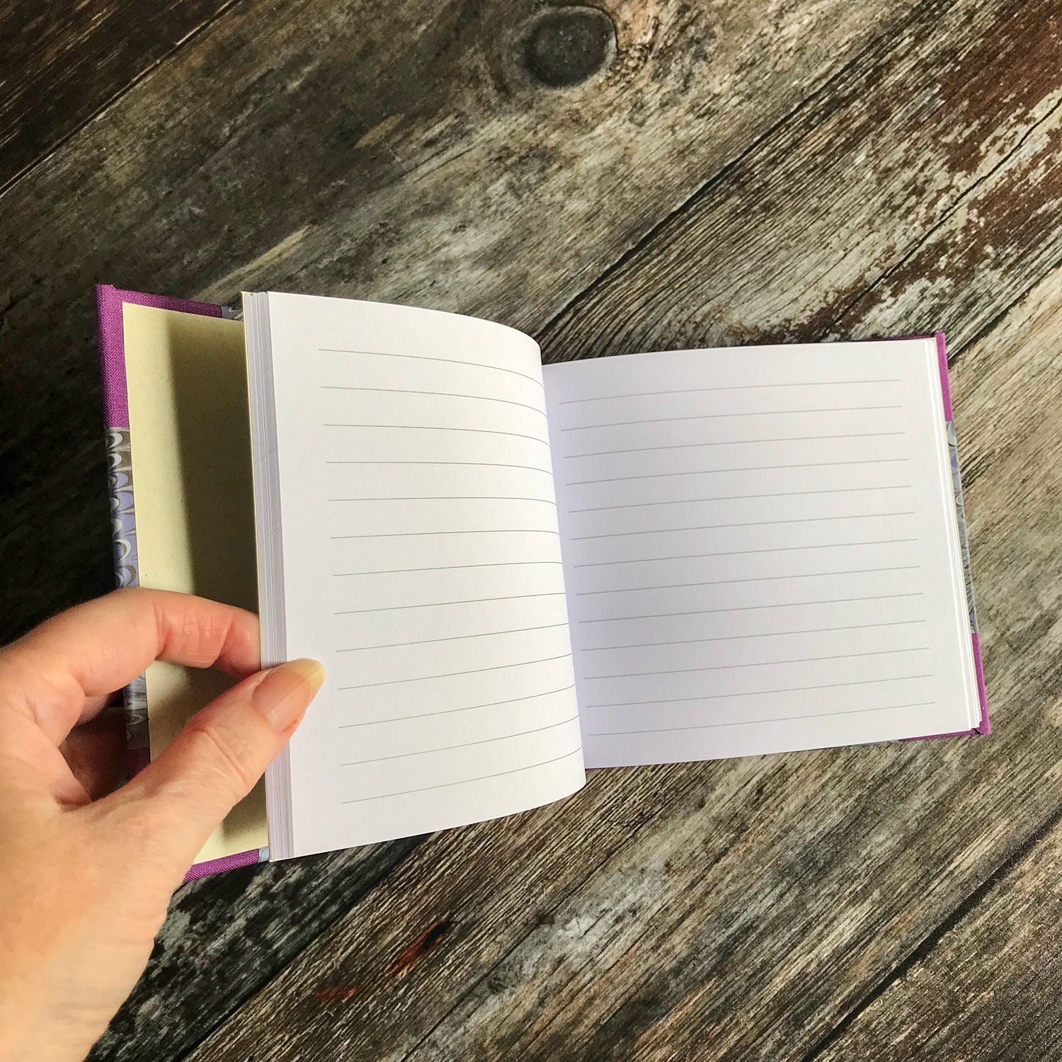 Notebook_marbled_paper_I_purple_open_pages.jpg