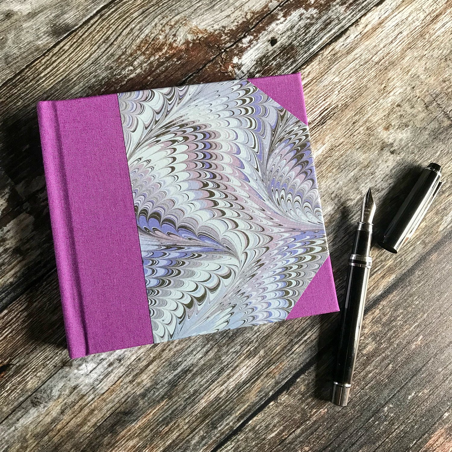 Notebook_marbled_paper_I_purple_pen.jpg
