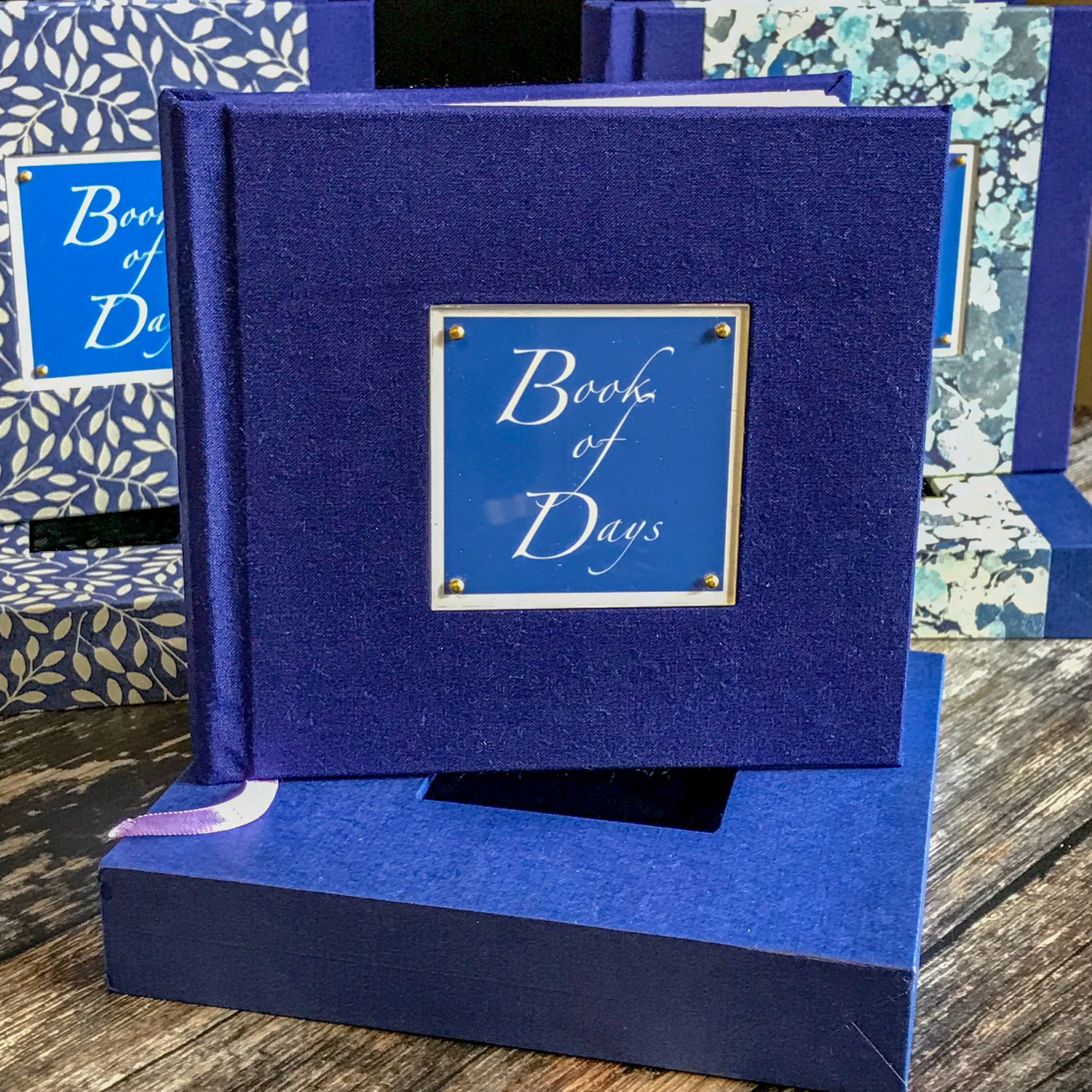 Book_of_Days_on_slipcase_bookcloth_in_front.jpg