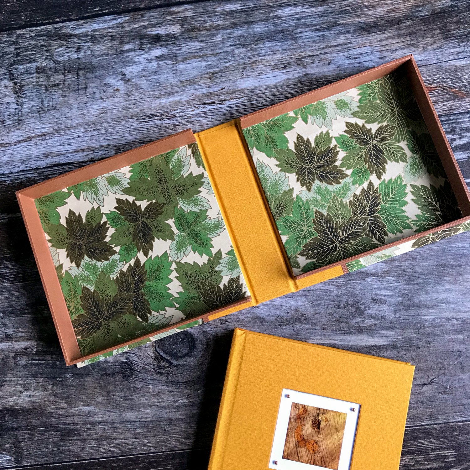 Saffron_Leaves_Woodpile_Clamshell_Case_open_with_notebook.jpg