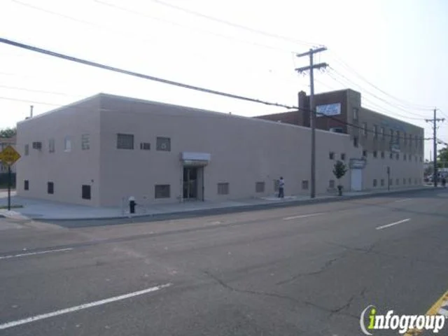 Page 48 -- The not very awe-inspiring headquarters of J.W. Hampton Jr. & Co. in Queens, NY, in business since 1865.