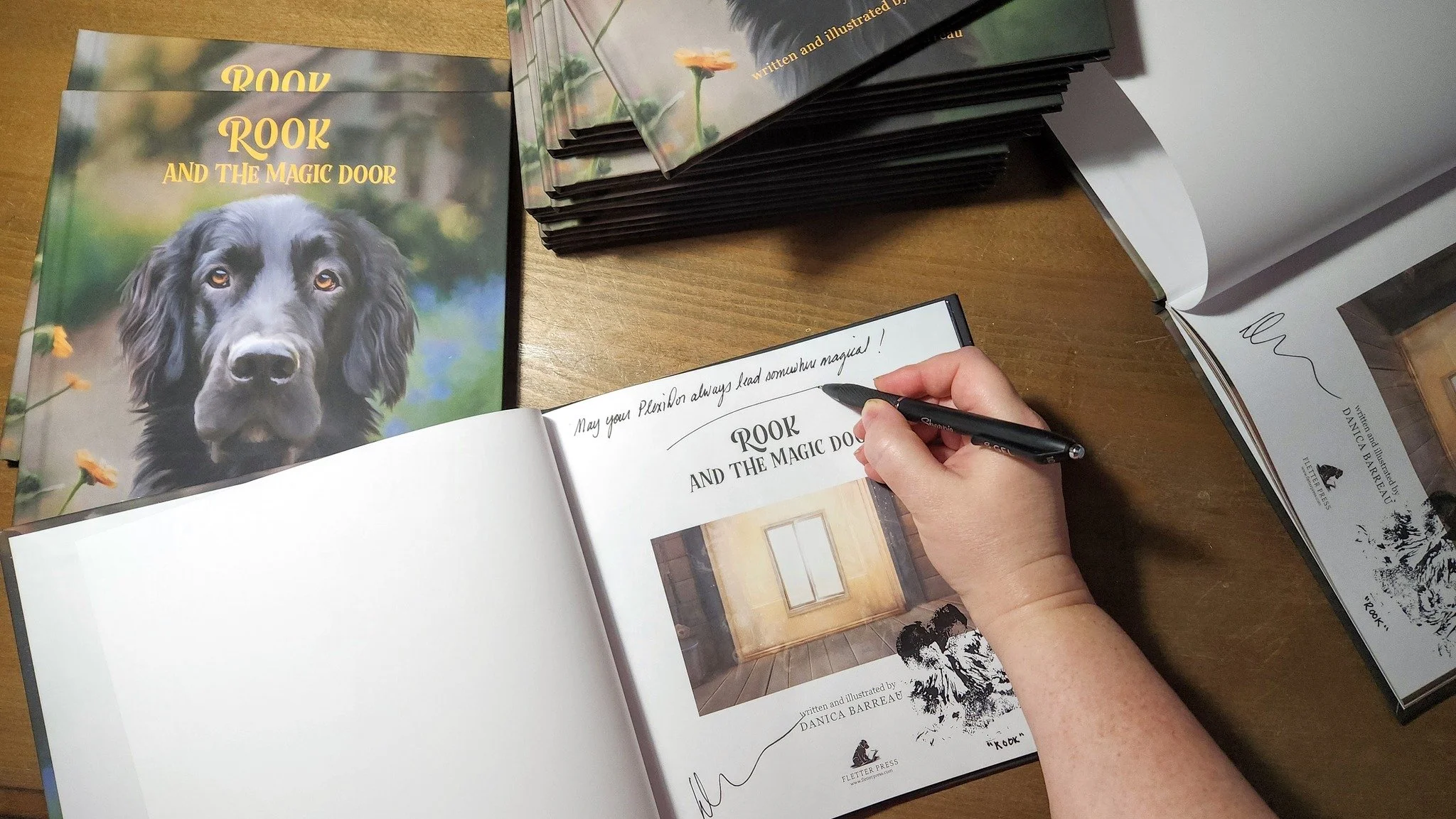 Did you know I wrote and illustrated a children's book inspired by my dog Rook and his rather unusual relationship with our dog door?

Well, that book recently caught the attention of @plexidorsdogdoor, and now Rook and I are autographing and pawtogr