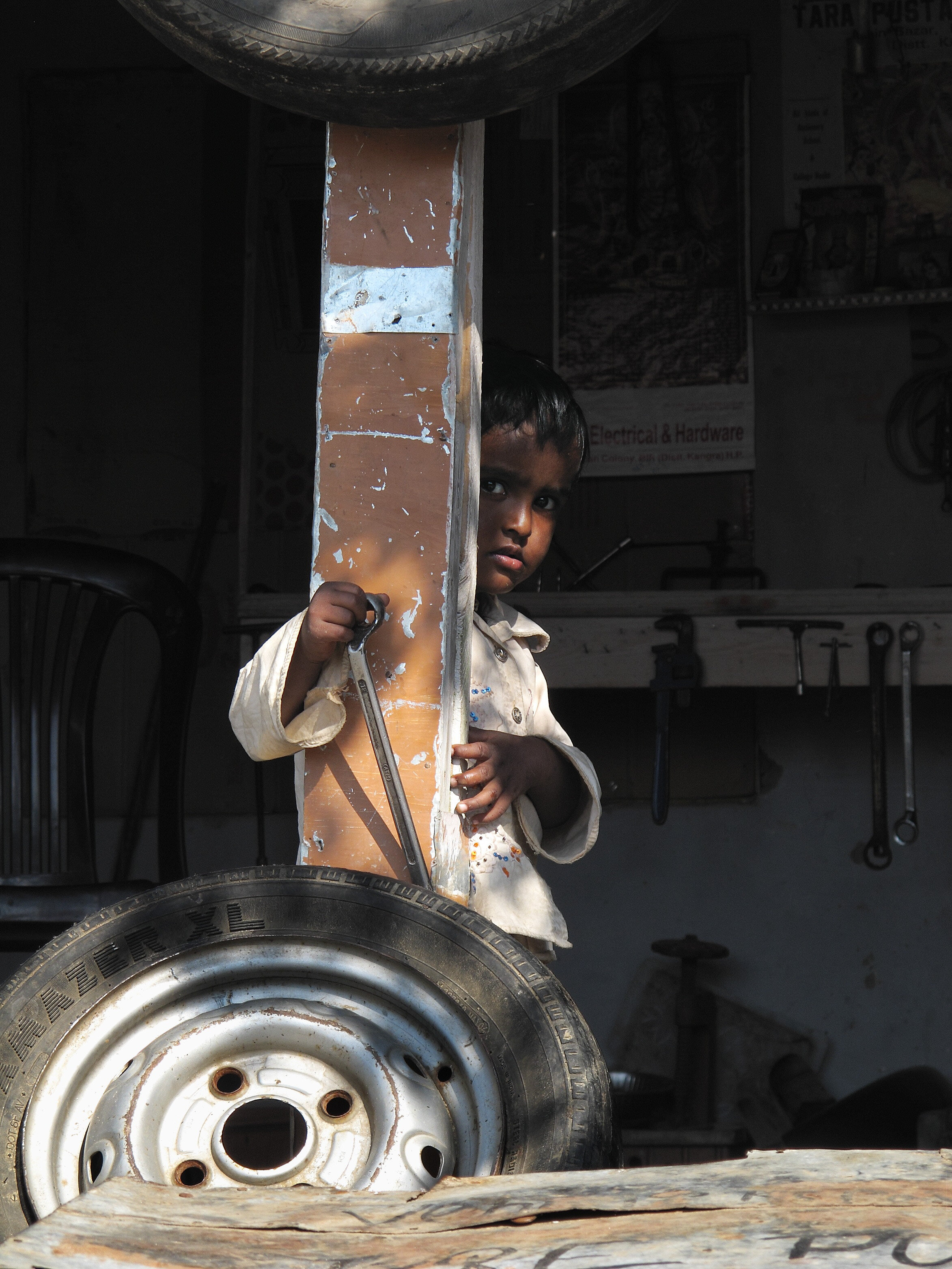 Child in Tire Shop India 2010